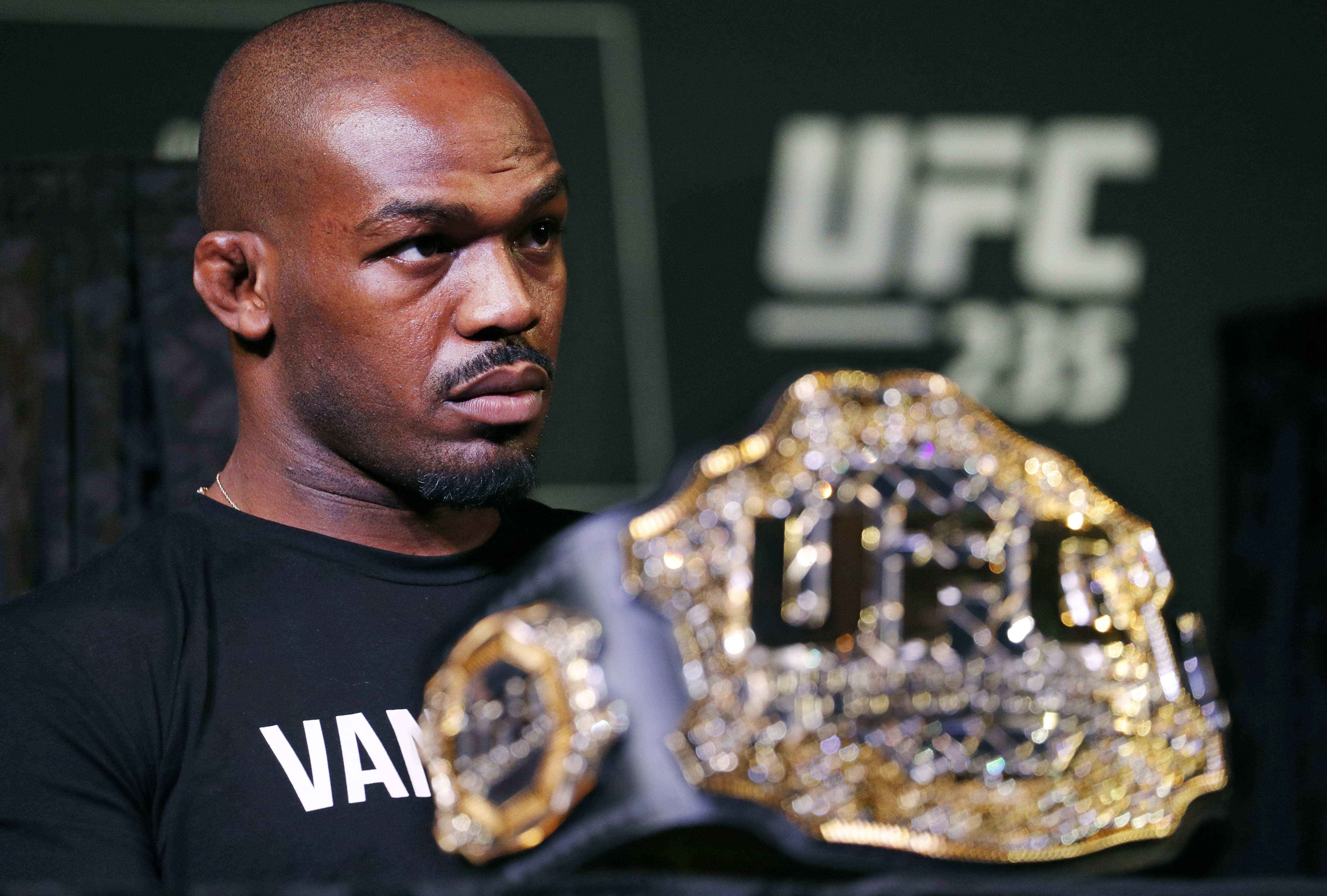 FILE - In this Jan. 31, 2019, file photo, light heavyweight champion Jon Jones attends a news conference for the UFC 235 mixed martial arts event in Las Vegas.