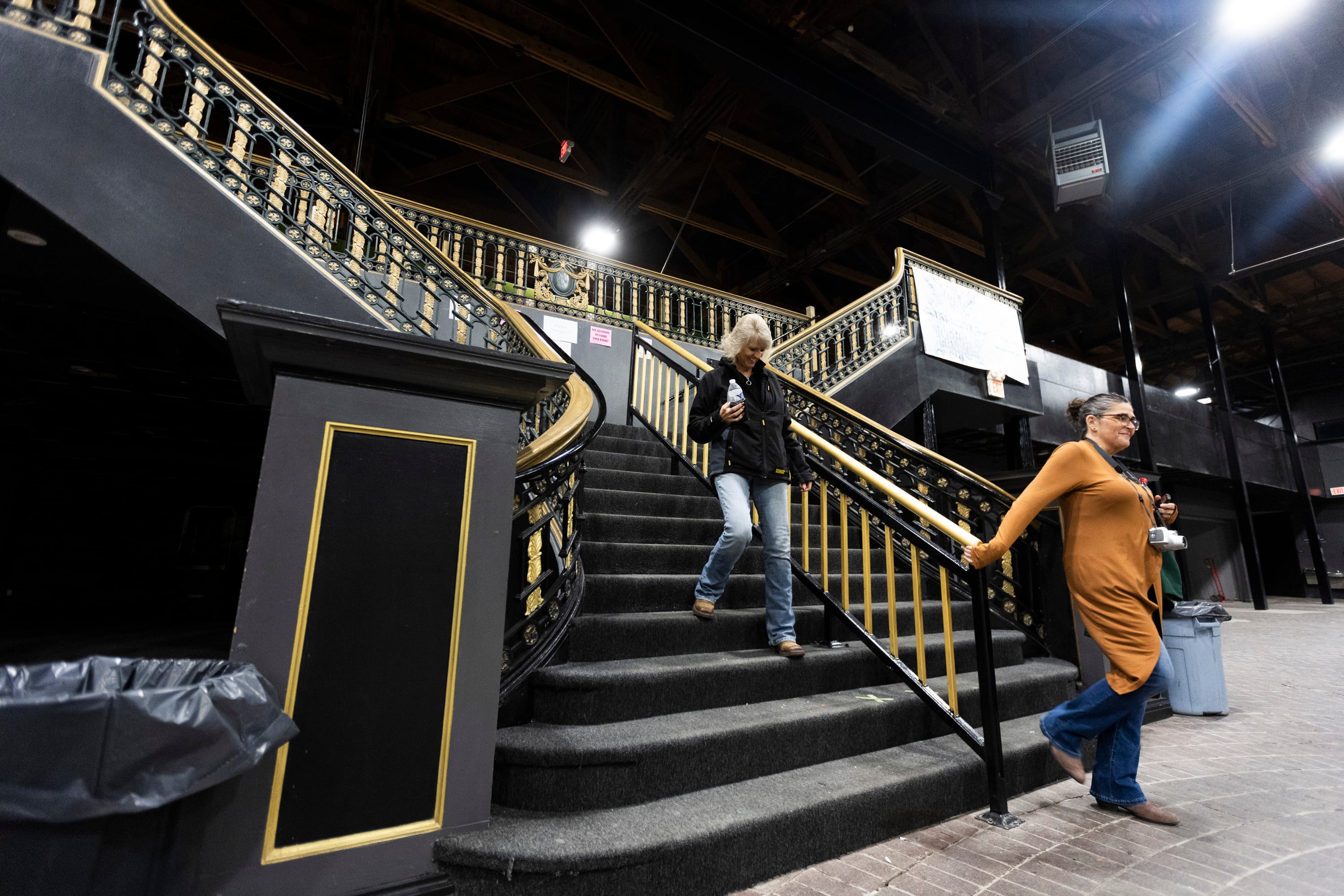 Investigators walk down a staircase during a paranormal event hosted by Mysteries and Legends Paranormal at the Great Saltair in Magna on Saturday. The staircase is supposed to have many paranormal stories of its own, originally being from the historic Hotel Utah.