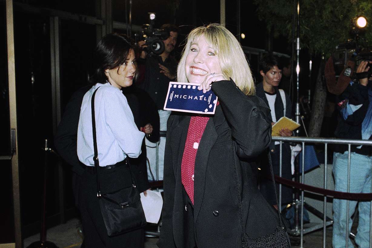Actress Teri Garr shows off her ticket at the premiere of "Michael," Dec. 19, 1996 in Beverly Hills, Calif. The film co-stars Garr and stars John Travolta along with William Hurt, Robert Pastorelli and Jean Stapleton.