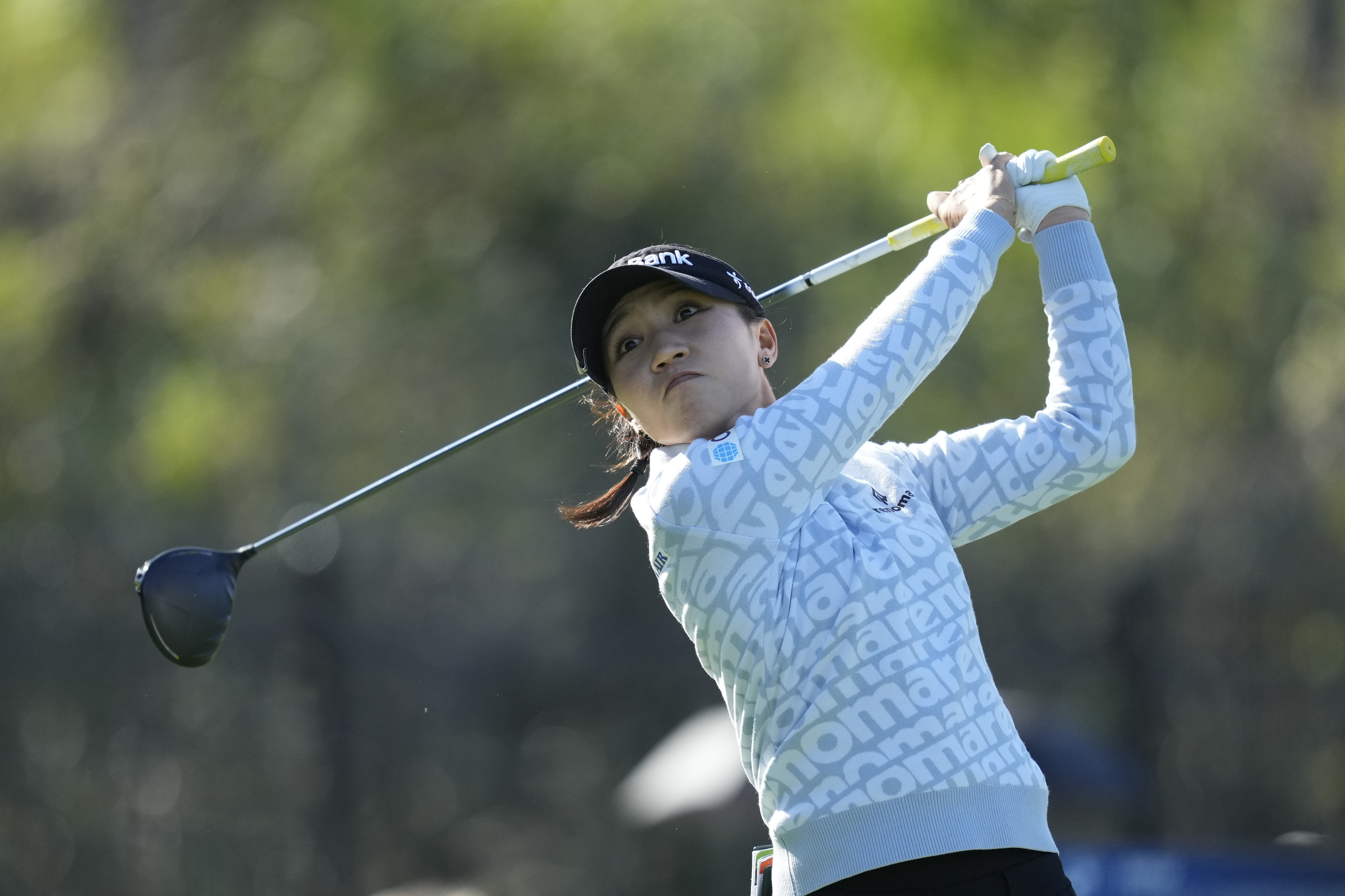 Lydia Ko of New Zealand watches her tee shot on the second hole during the final round of the LPGA Ladies Championship golf tournament at the Seowon Valley Country Club in Paju, South Korea, Sunday, Oct. 20, 2024.