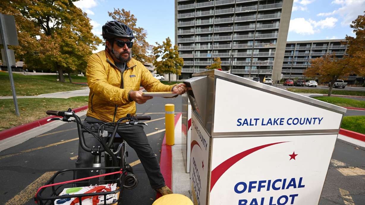 Paul Roberson, places his ballot into a drop box at the Salt Lake County Government Center on Monday. There are still several ways to return your ballots, but officials encourage voters to meet deadlines.