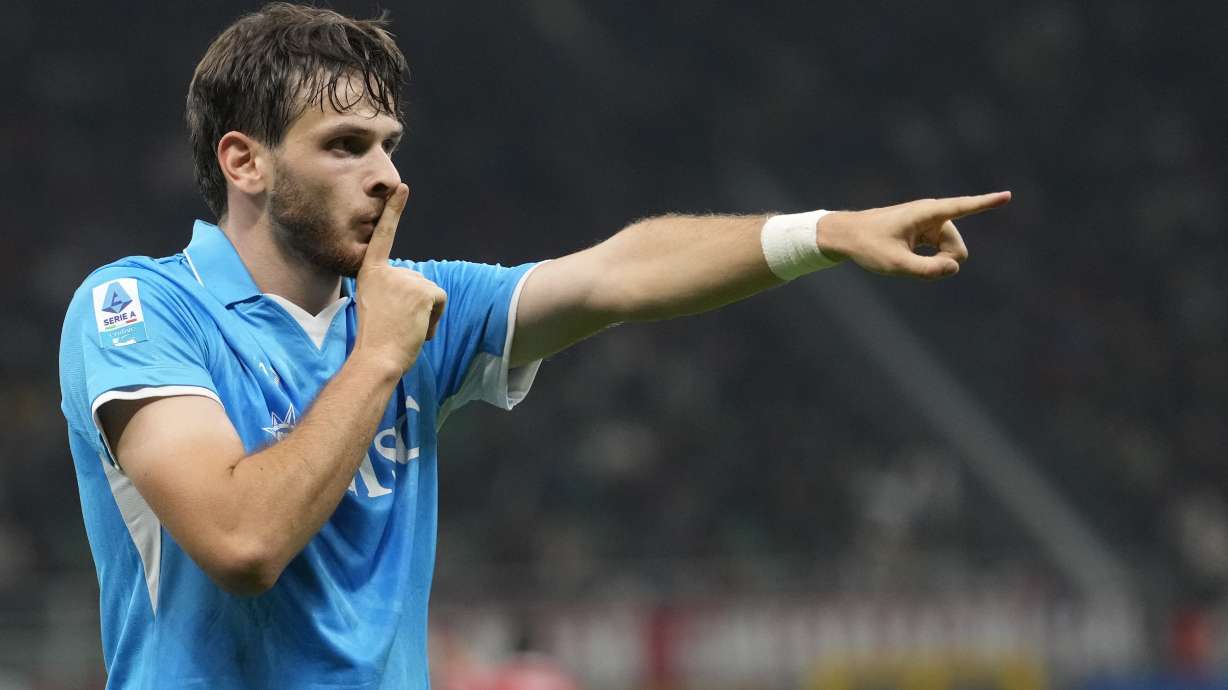 Napoli's Khvicha Kvaratskhelia celebrates after scoring his side's second goal during the Serie A soccer match between AC Milan and Napoli at the San Siro stadium, in Milan, Italy, Tuesday, Oct. 29, 2024.