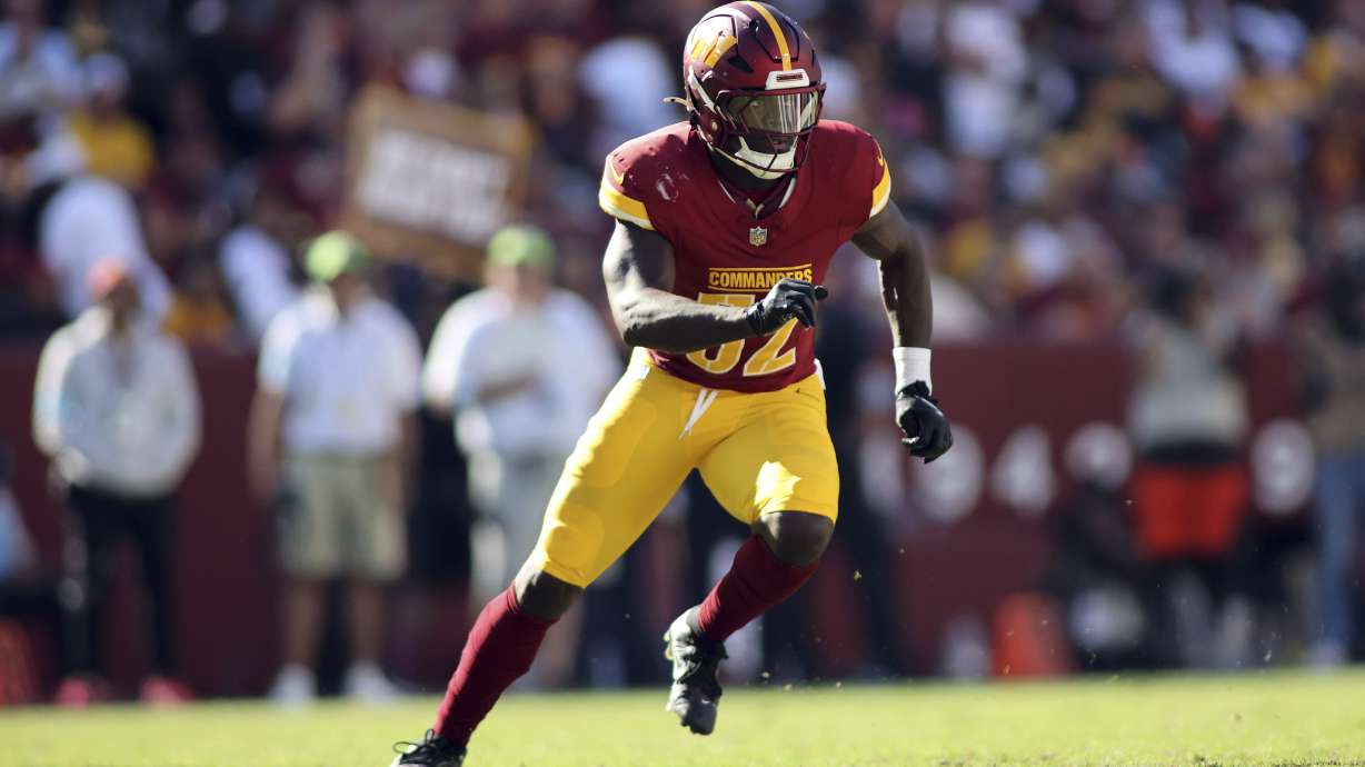 FILE - Washington Commanders linebacker Jamin Davis (52) rushes during an NFL football game against the Cleveland Browns, Sunday, Oct. 6, 2024 in Landover, Md.