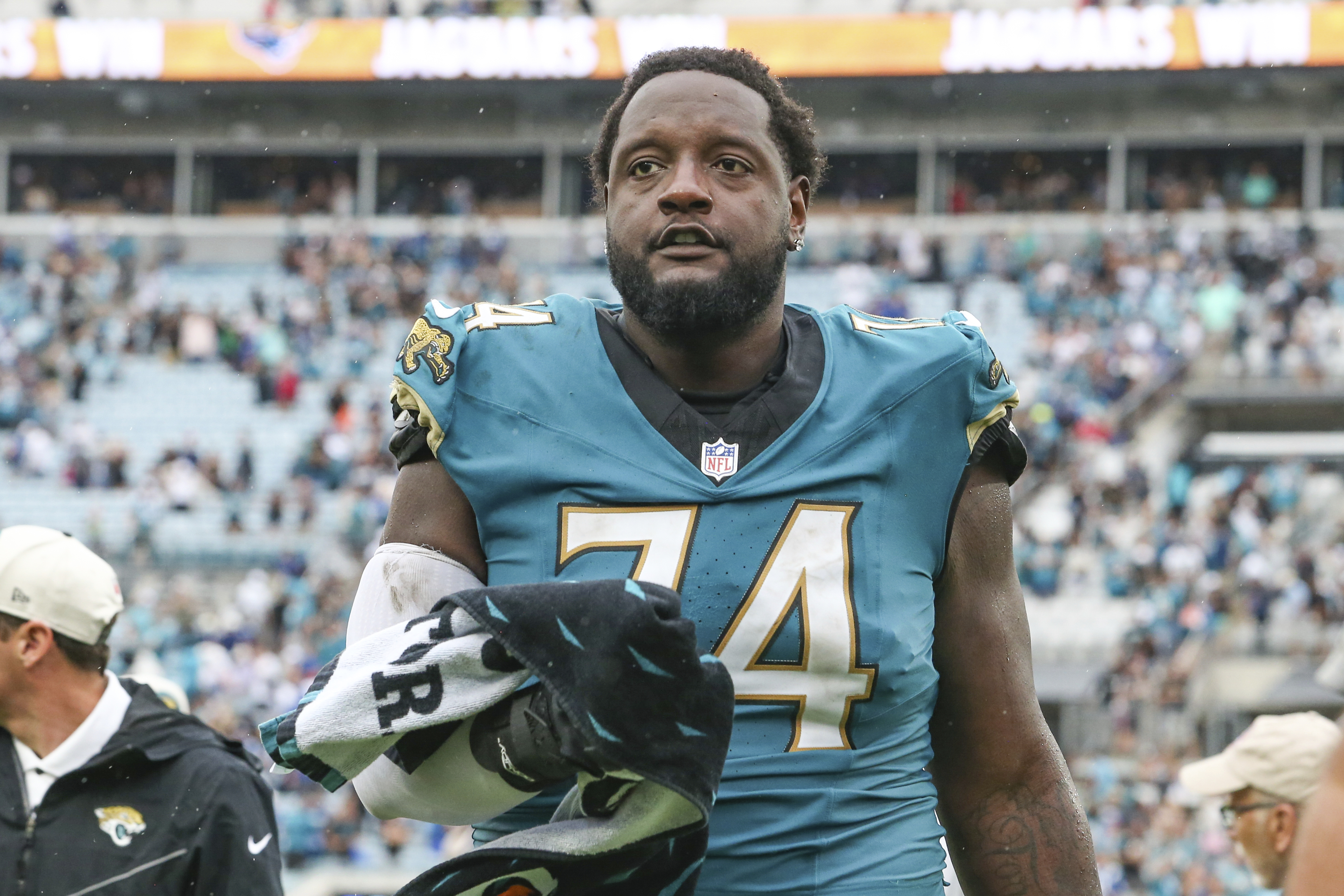 FILE -Jacksonville Jaguars offensive tackle Cam Robinson (74) leaves the field after an NFL football game against the Indianapolis Colts, Sunday, Oct. 6, 2024, in Jacksonville, Fla.