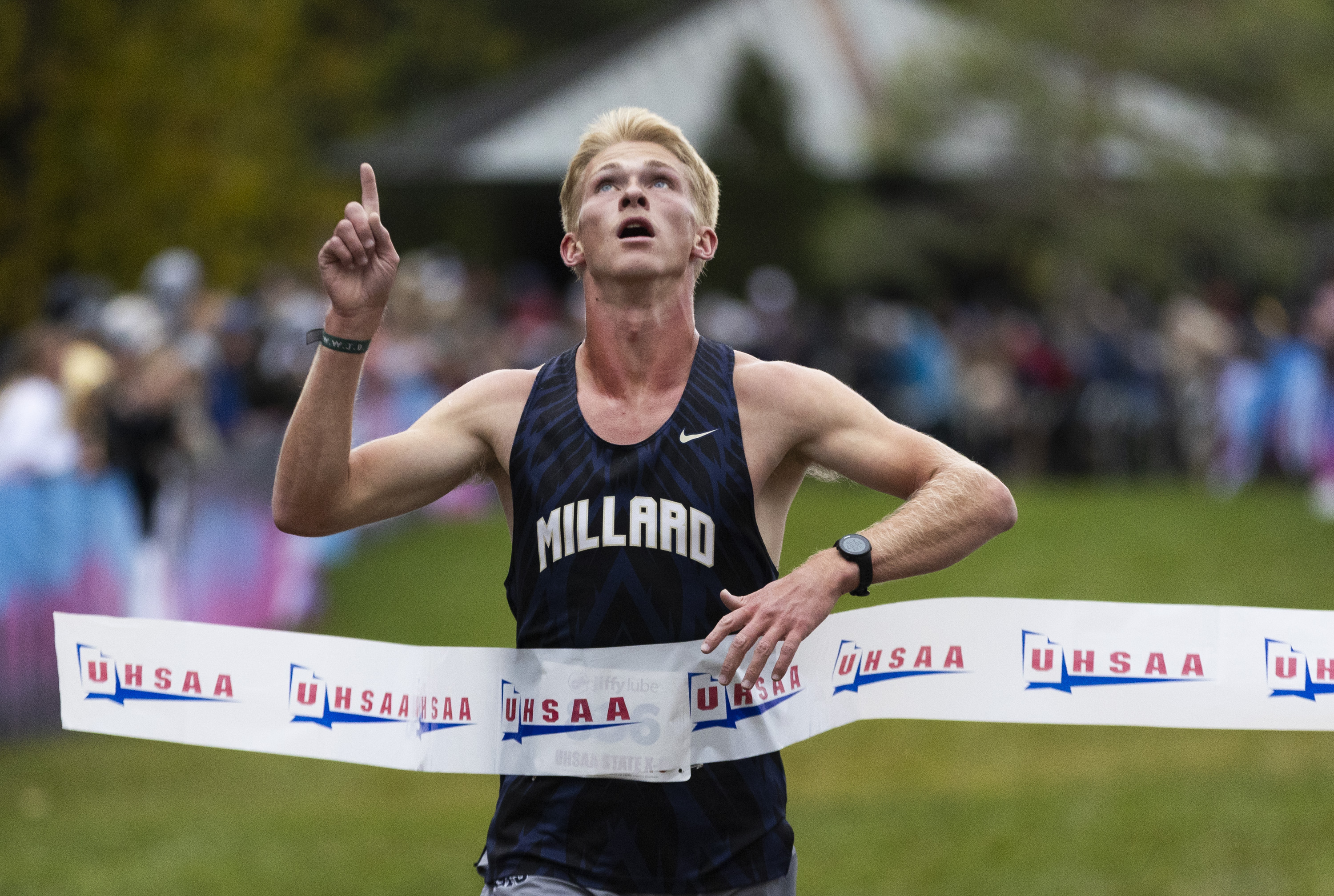 Millard’s Ben Ralphs crosses the finish line in first place during the 2A cross country state championships at Sugar House Park in Salt Lake City on Tuesday, Oct. 29, 2024.