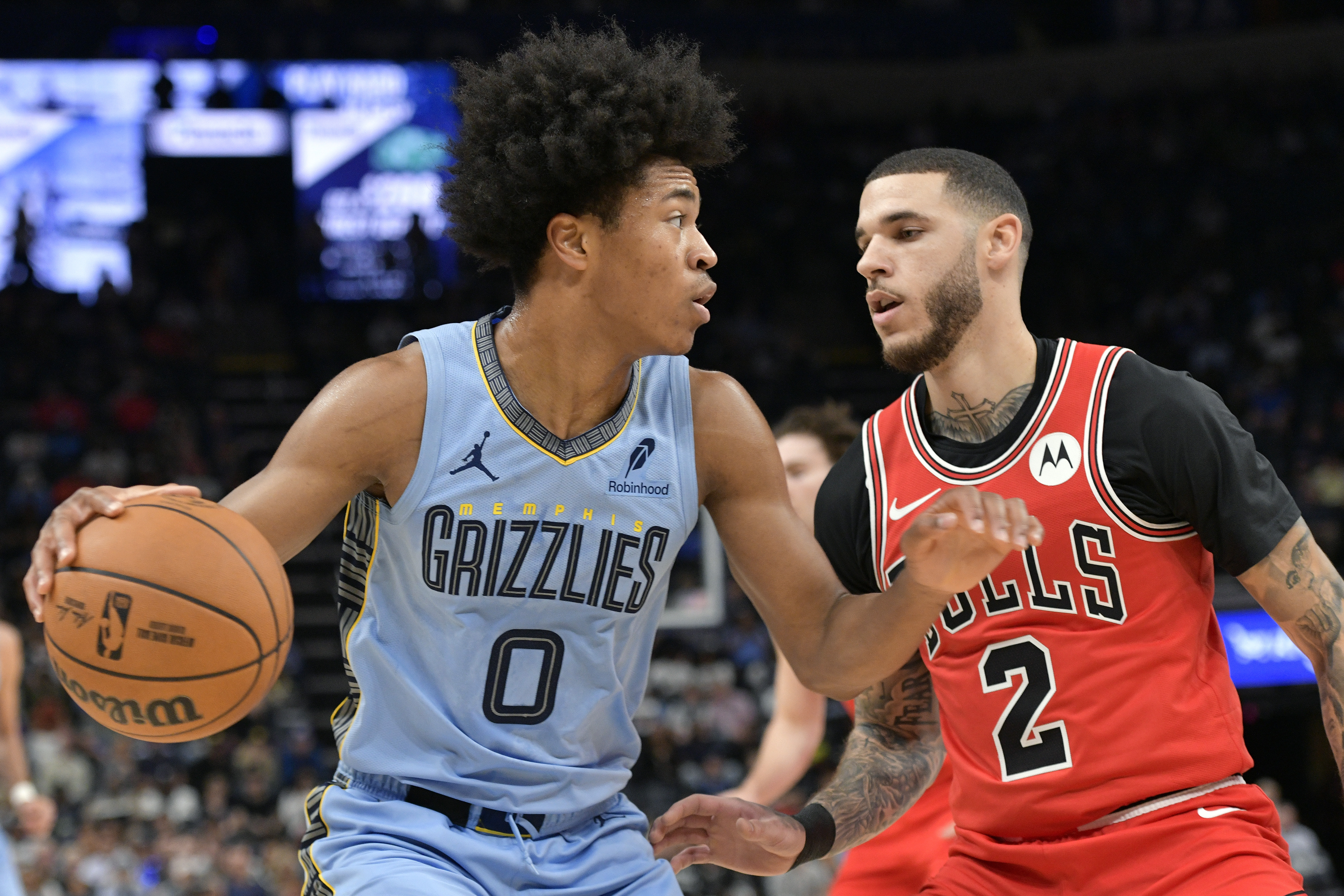 Memphis Grizzlies forward Jaylen Wells (0) handles the ball against Chicago Bulls guard Lonzo Ball (2) in the first half of an NBA basketball game Monday, Oct. 28, 2024, in Memphis, Tenn. 