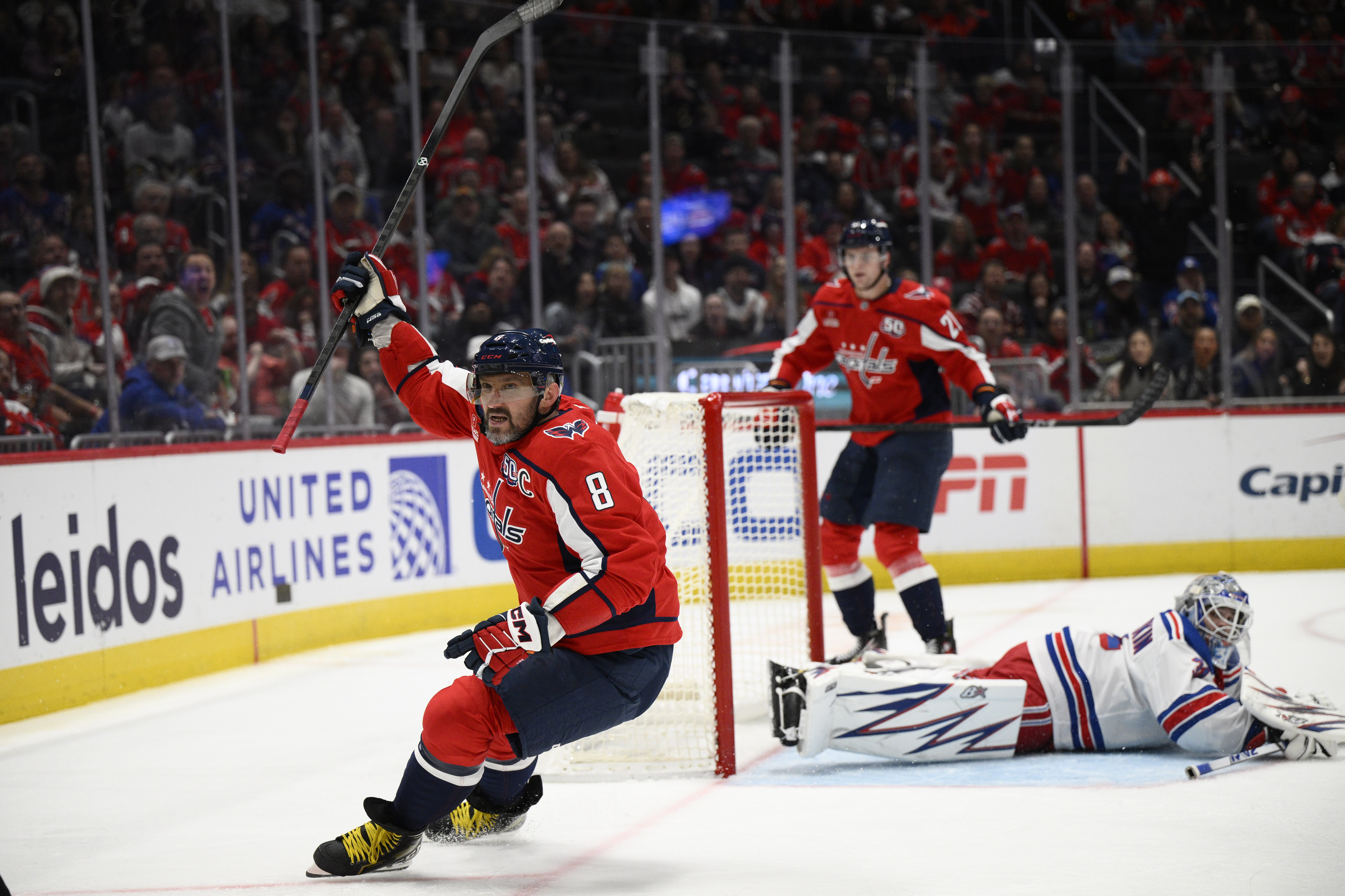 Washington Capitals left wing Alex Ovechkin (8) celebrates his second goal of the game during the first period of an NHL hockey game against New York Rangers goaltender Igor Shesterkin, Tuesday, Oct. 29, 2024, in Washington.