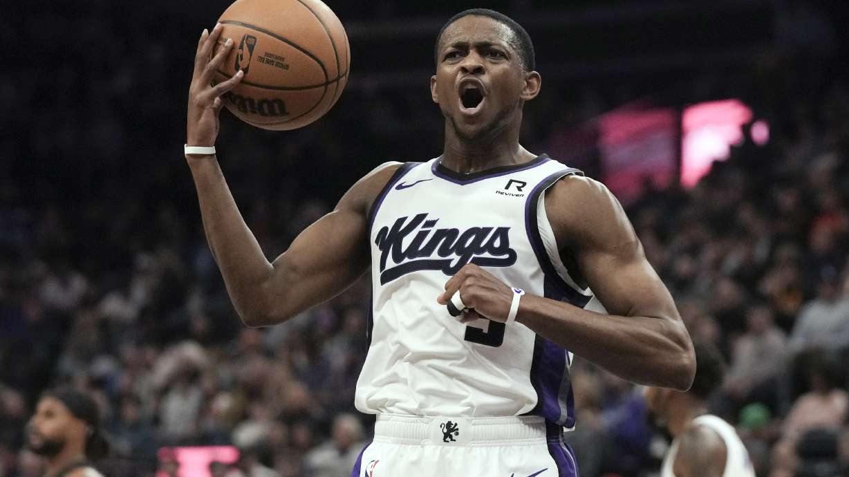 Sacramento Kings guard De'Aaron Fox (5) reacts to a call during the first half of an NBA basketball game against the Utah Jazz, Tuesday, Oct. 29, 2024, in Salt Lake City.