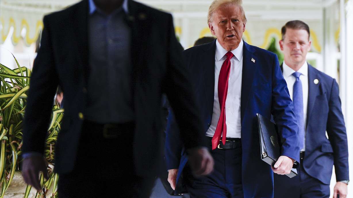 Republican presidential nominee former President Donald Trump arrives to a campaign event at his Mar-a-Lago estate, Tuesday, Oct. 29, 2024, in Palm Beach, Fla.