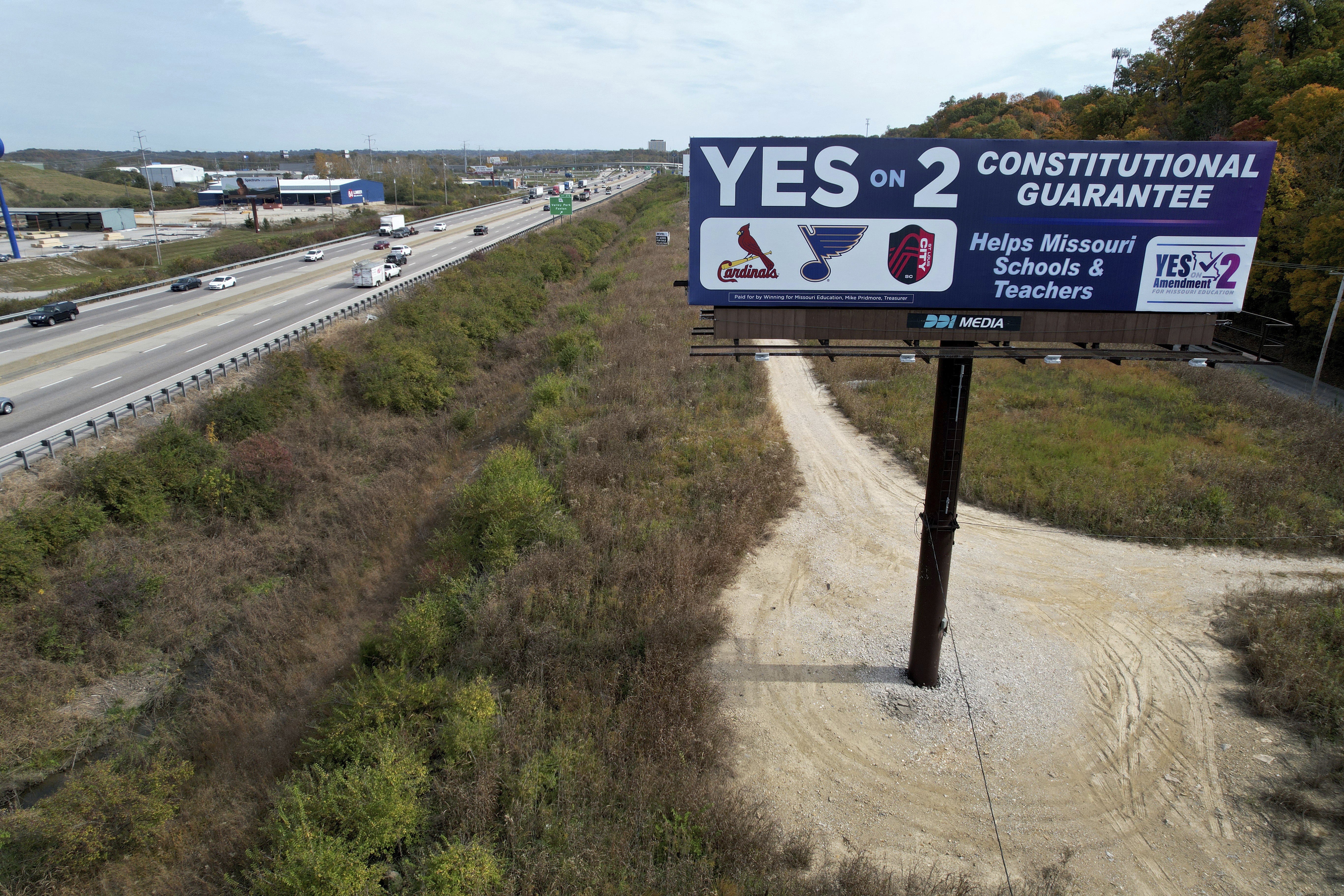 A billboard promoting a ballot measure to legalize sports betting in Missouri is seen along Interstate 44 Wednesday, Oct. 23, 2024, in St. Louis County, Mo. 