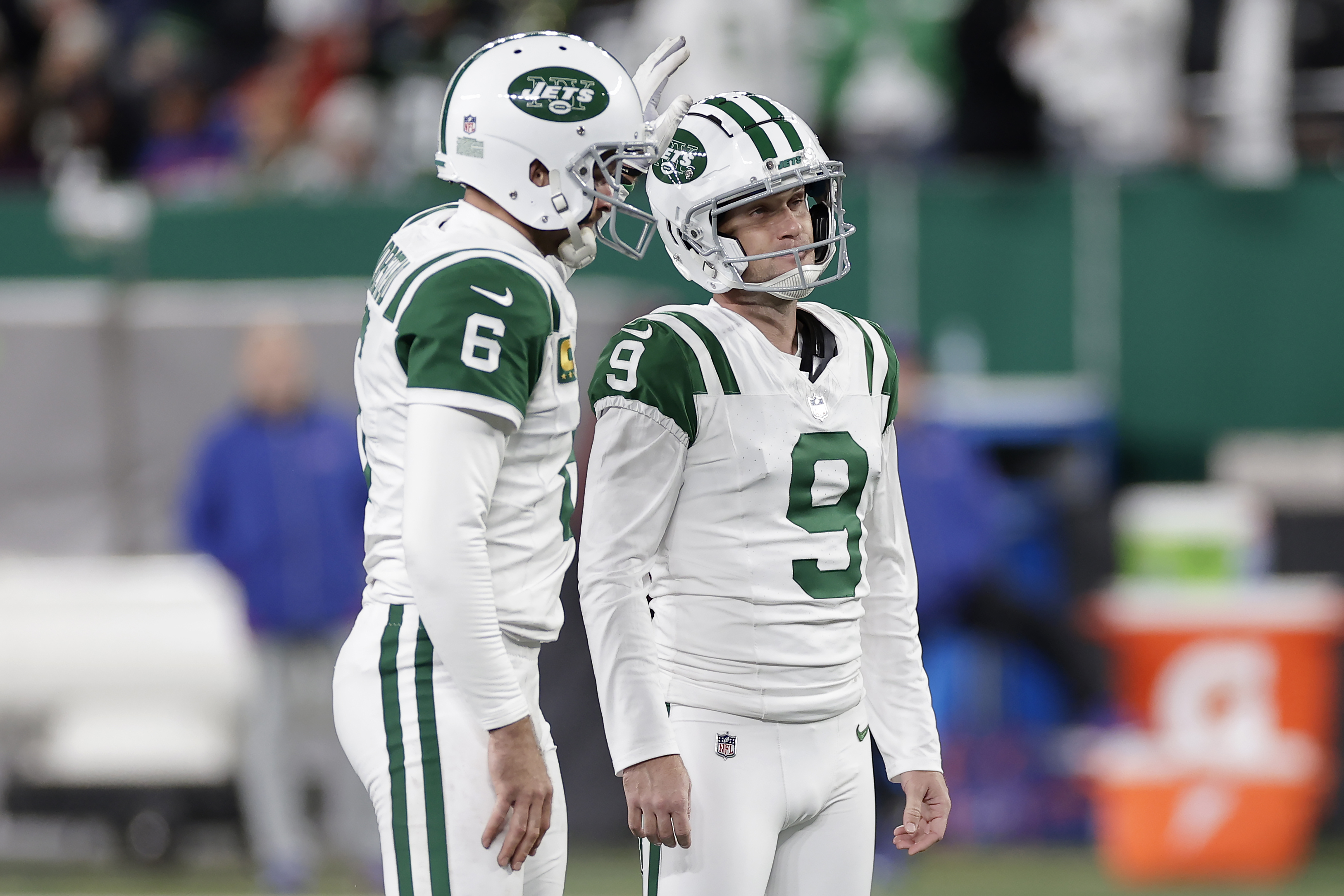 New York Jets place kicker Greg Zuerlein (9) reacts after missing a field goal attempt with Thomas Morstead during the second half of an NFL football game against the Buffalo Bills in East Rutherford, N.J., Monday, Oct. 14, 2024. 