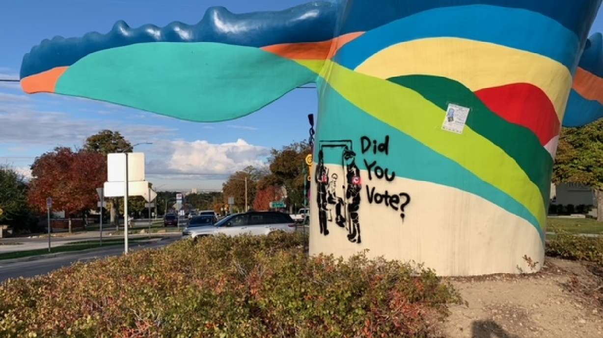 Graffiti is pictured Wednesday at the base of "Out of the Blue," a whale sculpture in Salt Lake City's 9th and 9th neighborhood. Police say the incident remains under investigation.