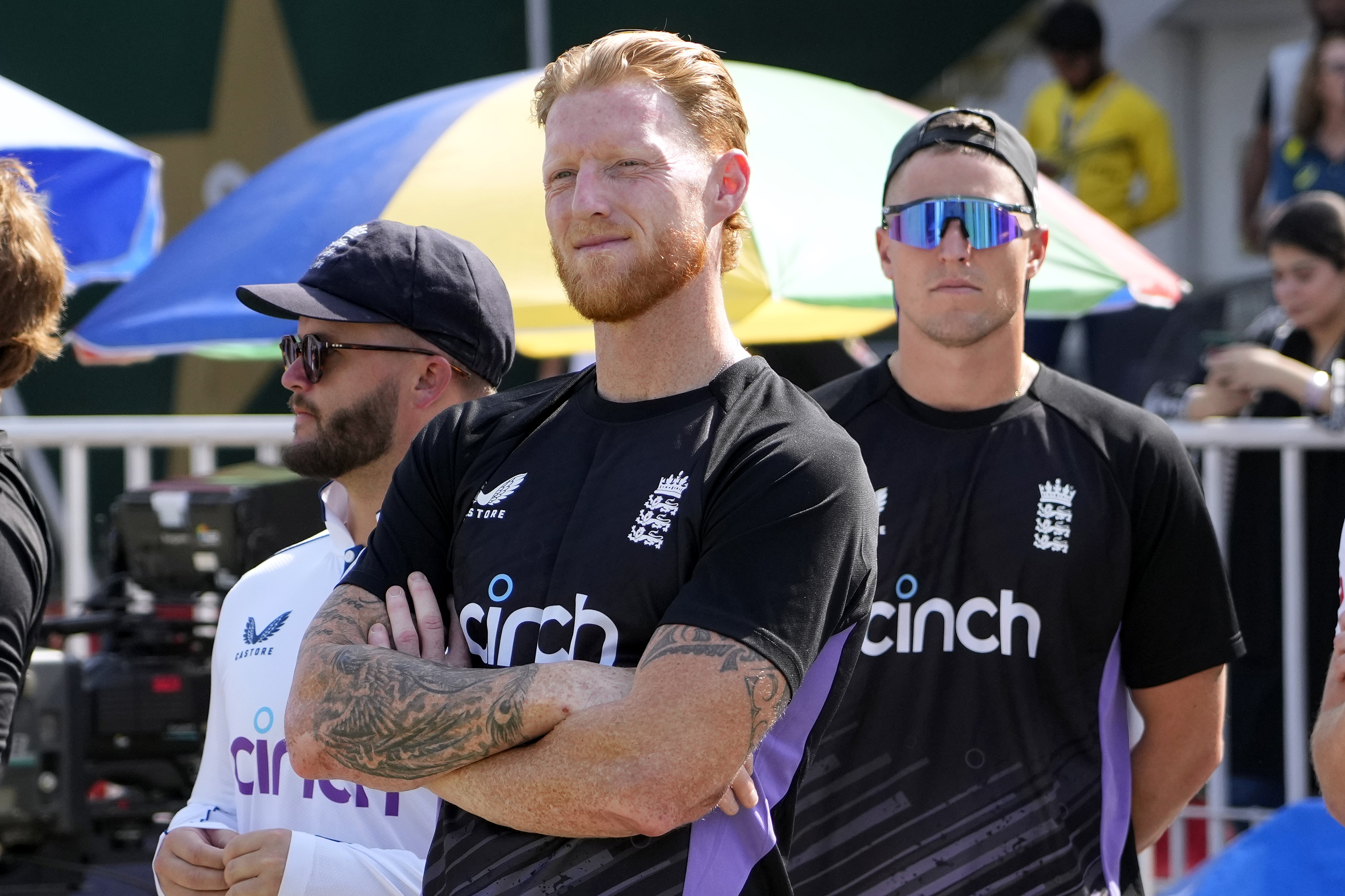 England's Ben Stokes, center, and teammates stand in a awarding ceremony on the end of third test cricket match between Pakistan and England, in Rawalpindi, Pakistan, Saturday, Oct. 26, 2024. 