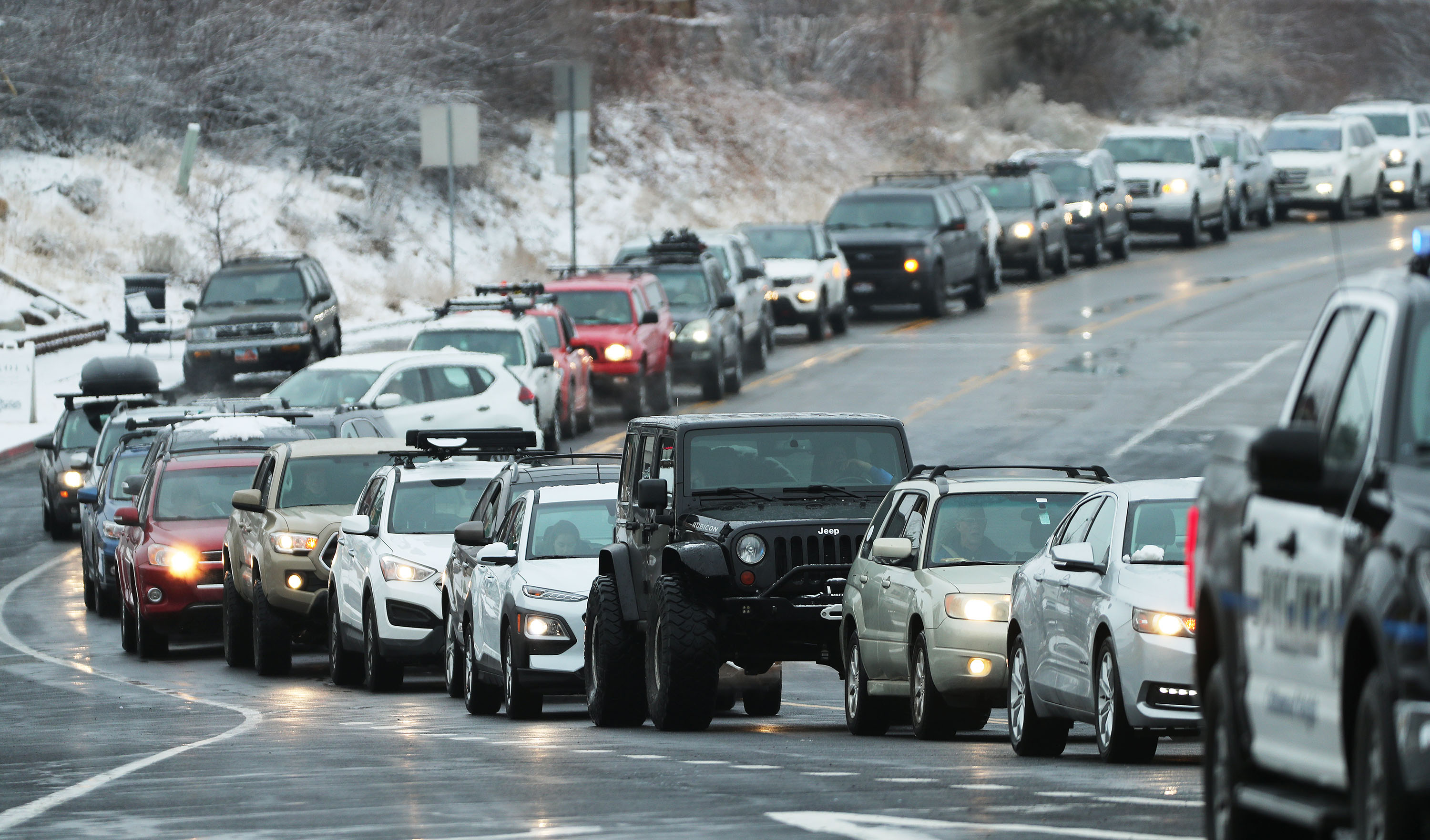 Skier traffic is backed up on Wasatch Boulevard at the mouth of Big Cottonwood Canyon in Salt Lake City on Jan. 24, 2021.