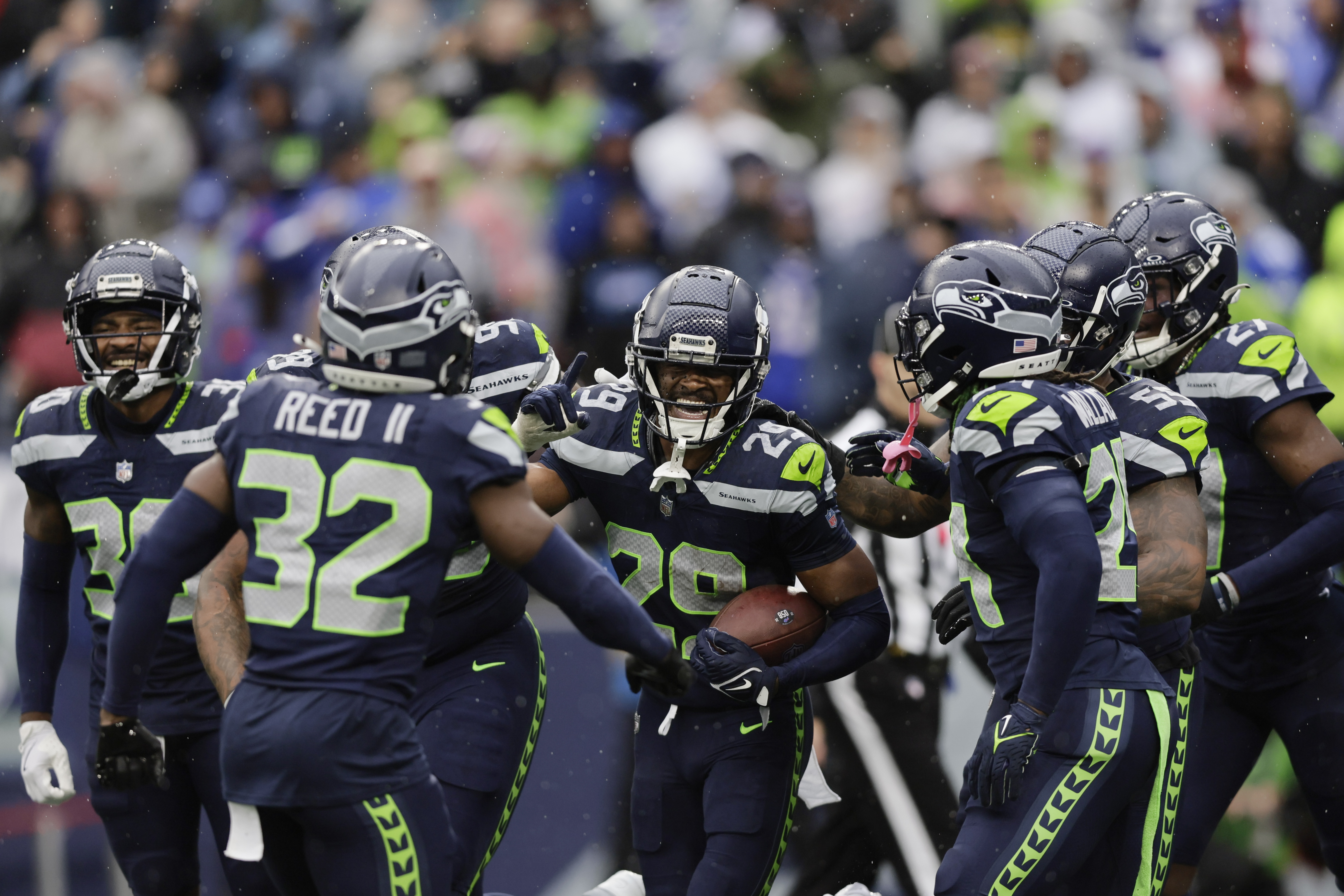 Seattle Seahawks cornerback Josh Jobe (29) celebrates after making an interception during the first half of an NFL football game against the Buffalo Bills, Sunday, Oct. 27, 2024, in Seattle.