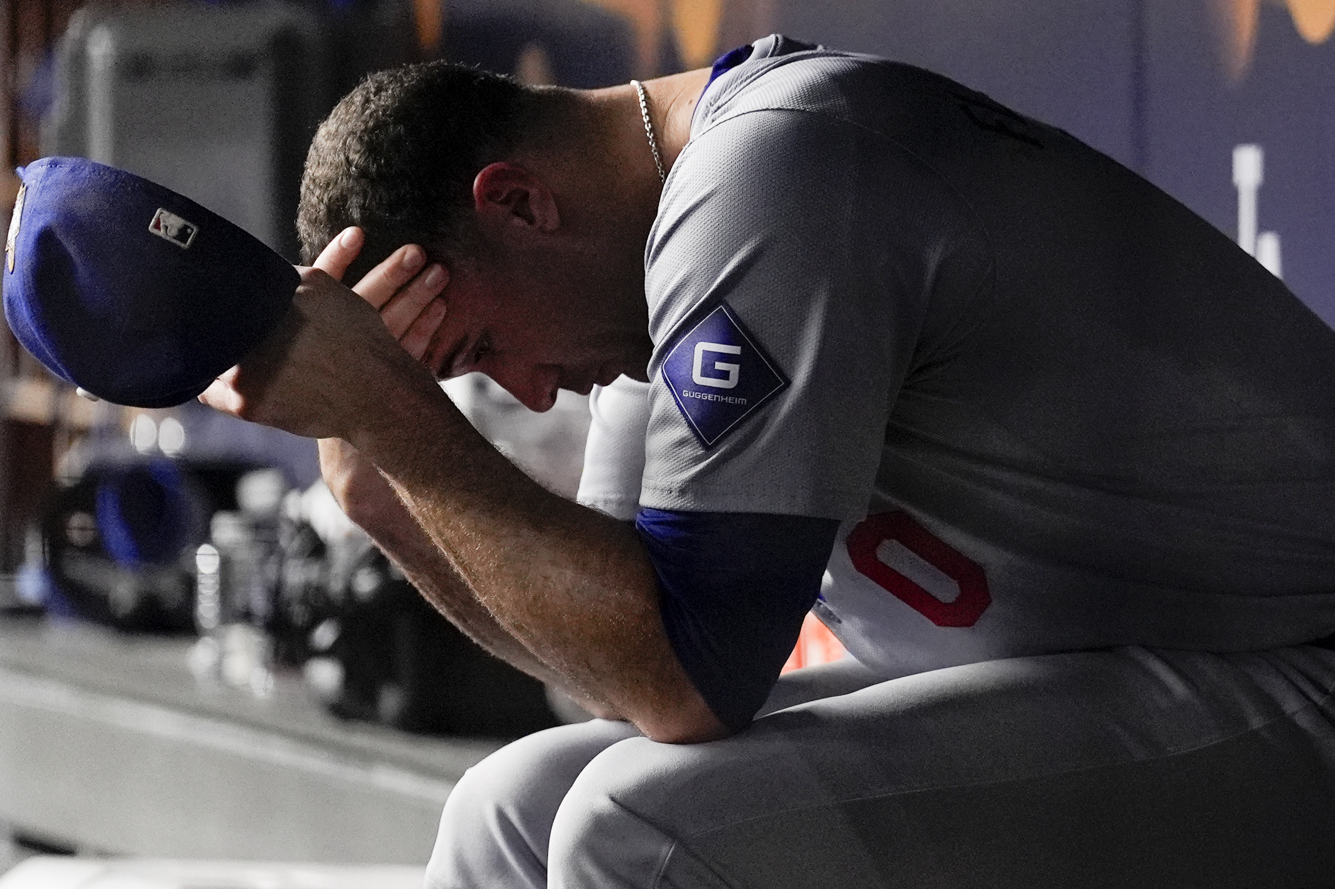 Los Angeles Dodgers pitcher Jack Flaherty sits in the dugout after being taken out of the game in the second inning against the New York Yankees in Game 5 of the baseball World Series, Wednesday, Oct. 30, 2024, in New York. 