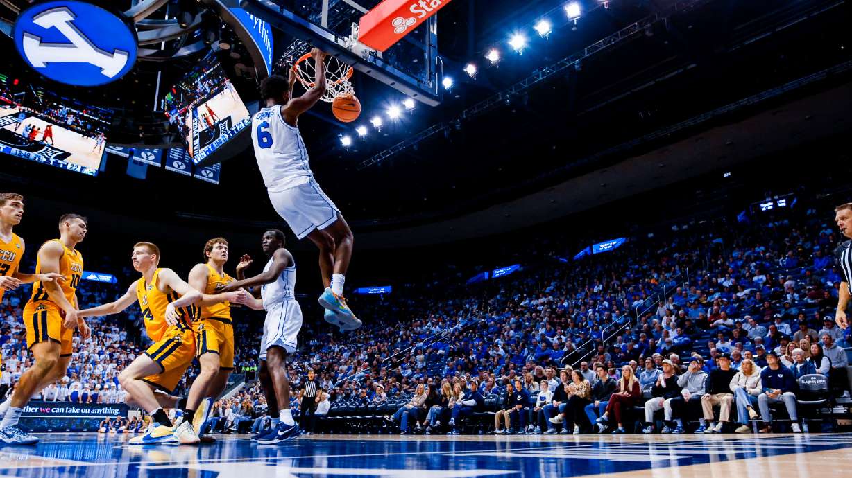 BYU wing Kanon Catchings throws down a dunk during an exhibition win over Colorado Christian, Wednesday, Oct. 30, 2024 at the Marriott Center in Provo, Utah.