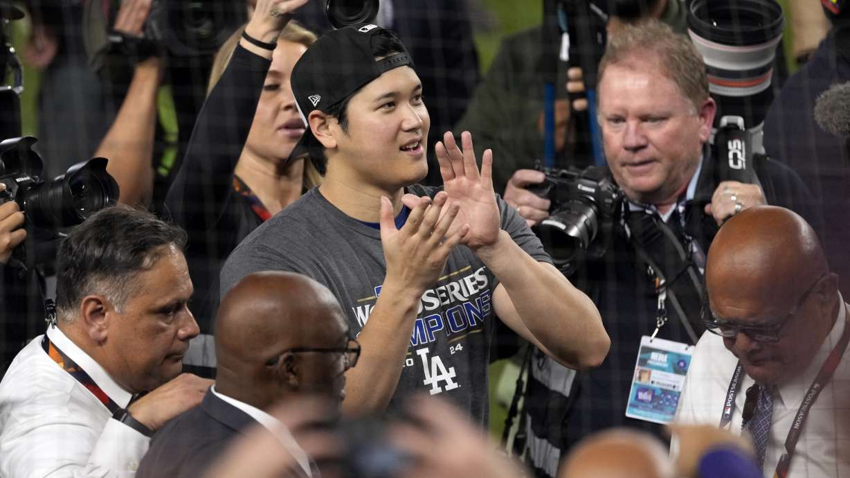 Los Angeles Dodgers' Shohei Ohtani celebrates after the Dodgers beat the New York Yankees in Game 5 to win the baseball World Series, Thursday, Oct. 31, 2024, in New York.