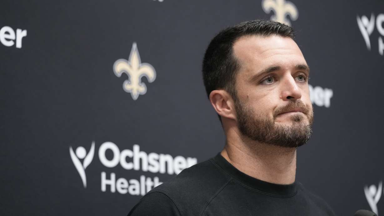 New Orleans Saints quarterback Derek Carr speaks during a news conference following an NFL football game against the Kansas City Chiefs Monday, Oct. 7, 2024, in Kansas City, Mo.