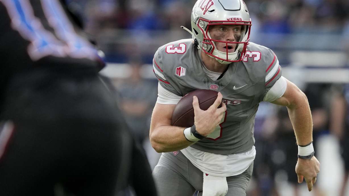 FILE - UNLV quarterback Matthew Sluka runs the ball against Kansas in the first half of an NCAA college football game Friday, Sept. 13, 2024, at Children's Mercy Park in Kansas City, Kan.