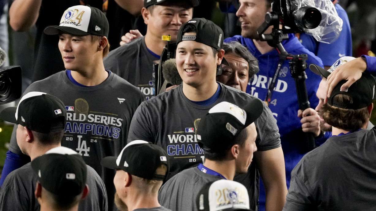 Los Angeles Dodgers' Shohei Ohtani celebrates their win against the New York Yankees in Game 5 to win the baseball World Series, Thursday, Oct. 31, 2024, in New York.