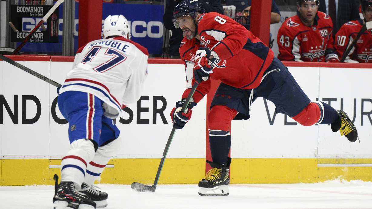 Washington Capitals left wing Alex Ovechkin (8) skates with the puck against Montreal Canadiens defenseman Jayden Struble (47) during the first period of an NHL hockey game, Thursday, Oct. 31, 2024, in Washington.