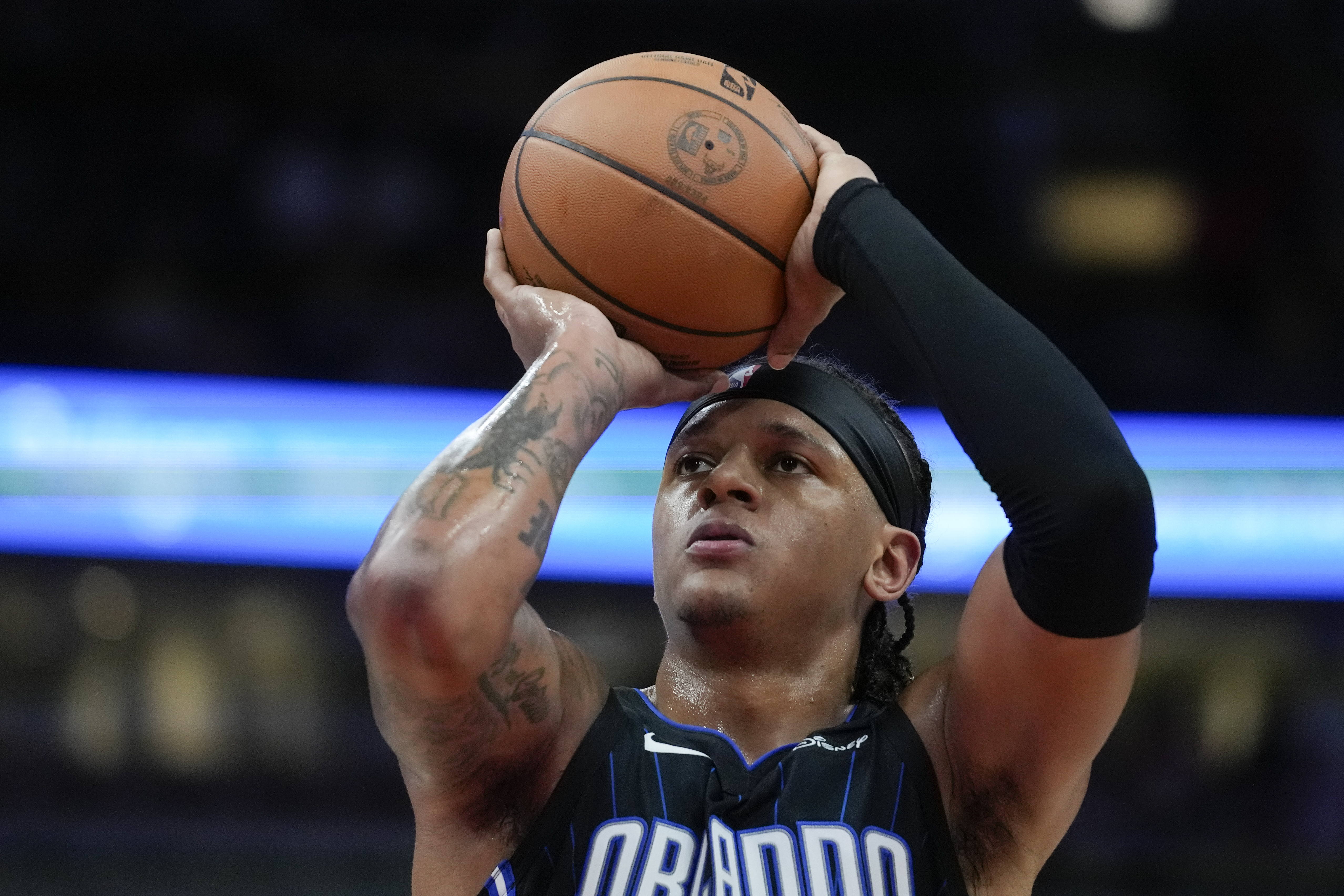 Orlando Magic forward Paolo Banchero shoots a free throw during the first half of an NBA basketball game against the Chicago Bulls, Wednesday, Oct. 30, 2024, in Chicago.
