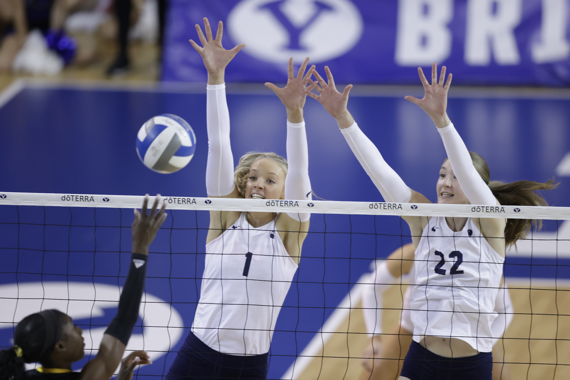 BYU's Kate Prior, left, and Kjersti Strong leap for a block during a Big 12 women's volleyball match against No. 13 Arizona State, Thursday, Oct. 31, 2024, at the Smith Fieldhouse in Provo, Utah.