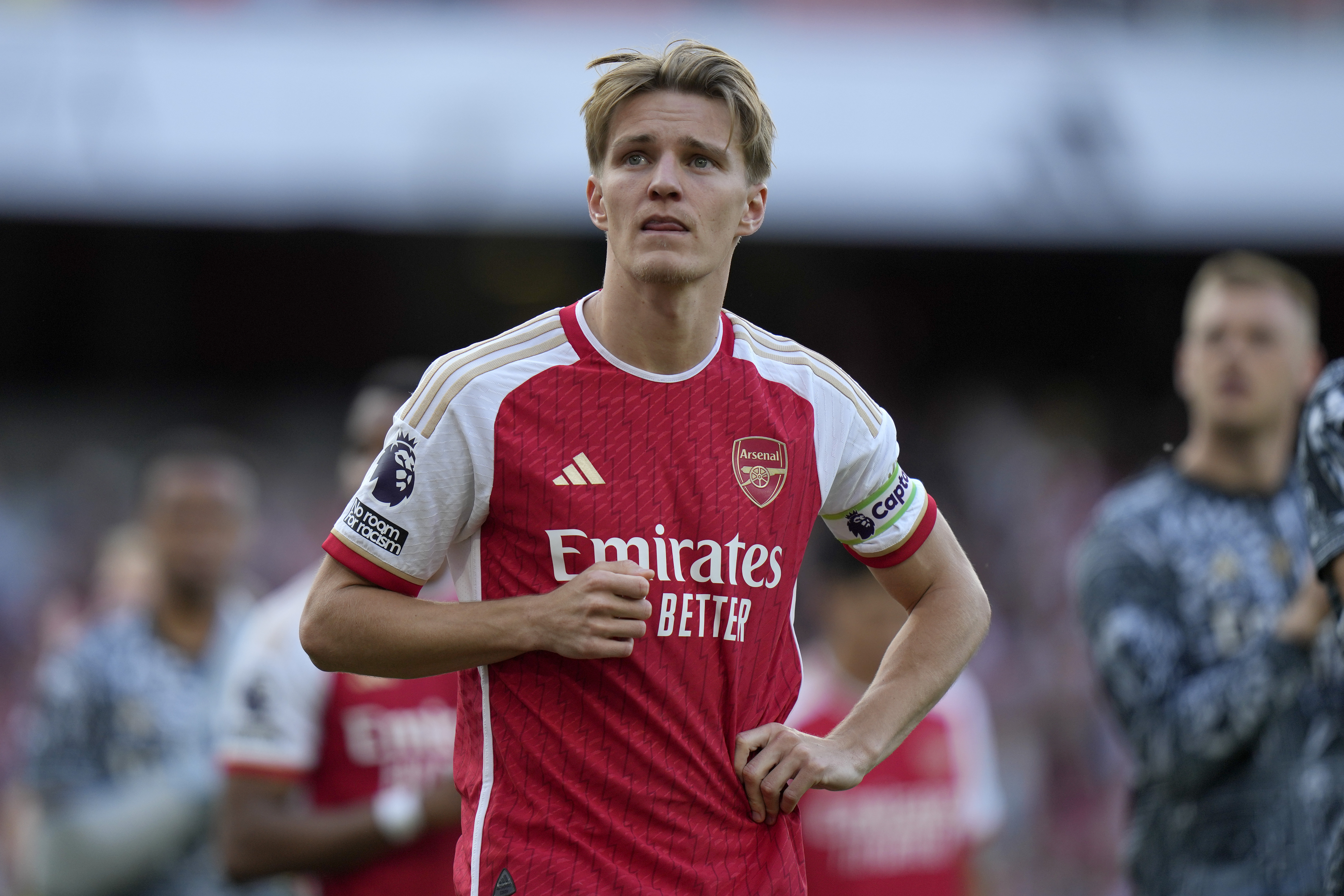 FILE - Arsenal's Martin Odegaard reacts at the end of the English Premier League soccer match between Arsenal and Everton at the Emirates stadium in London, Sunday, May 19, 2024. 