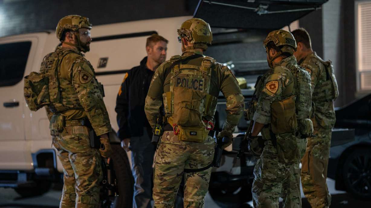 A man who allegedly held a woman in her apartment before barricading himself was arrested following a 3½-hour standoff with the Salt Lake City Police Department's SWAT team.