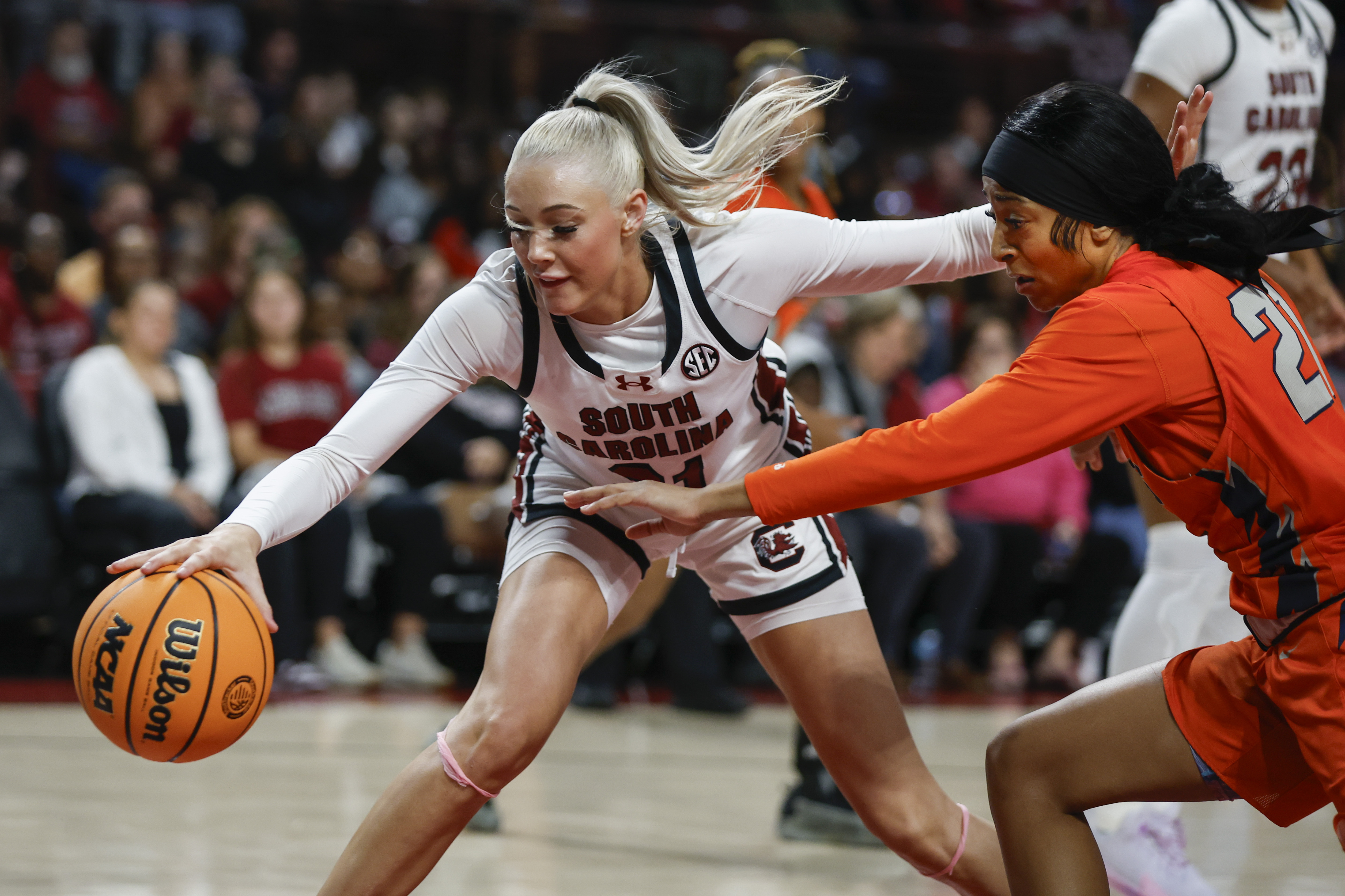 South Carolina forward Chloe Kitts, left, battles for a loose ball against Clayton State forward Aniya Jones during the second half of an exhibition NCAA college basketball game in Columbia, S.C., Monday, Oct. 28, 2024.