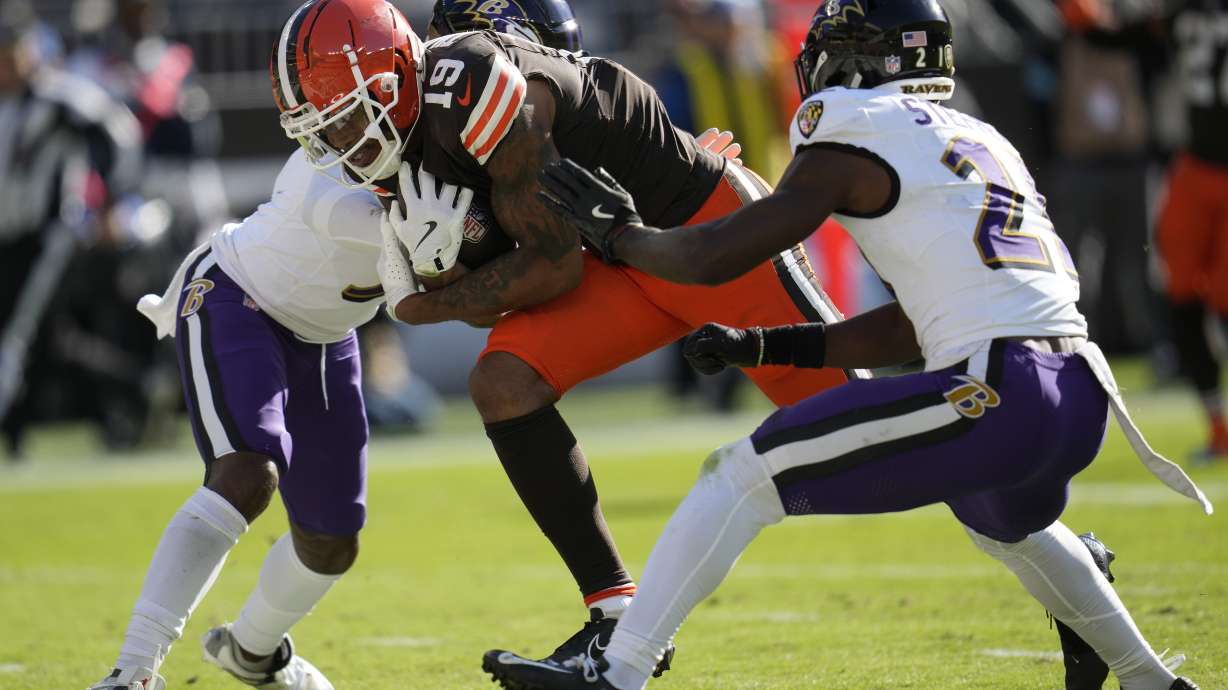 Cleveland Browns wide receiver Cedric Tillman (19) gets past Baltimore Ravens cornerback Brandon Stephens (21) on his way to a touchdown during the second half of an NFL football game in Cleveland, Sunday, Oct. 27, 2024.