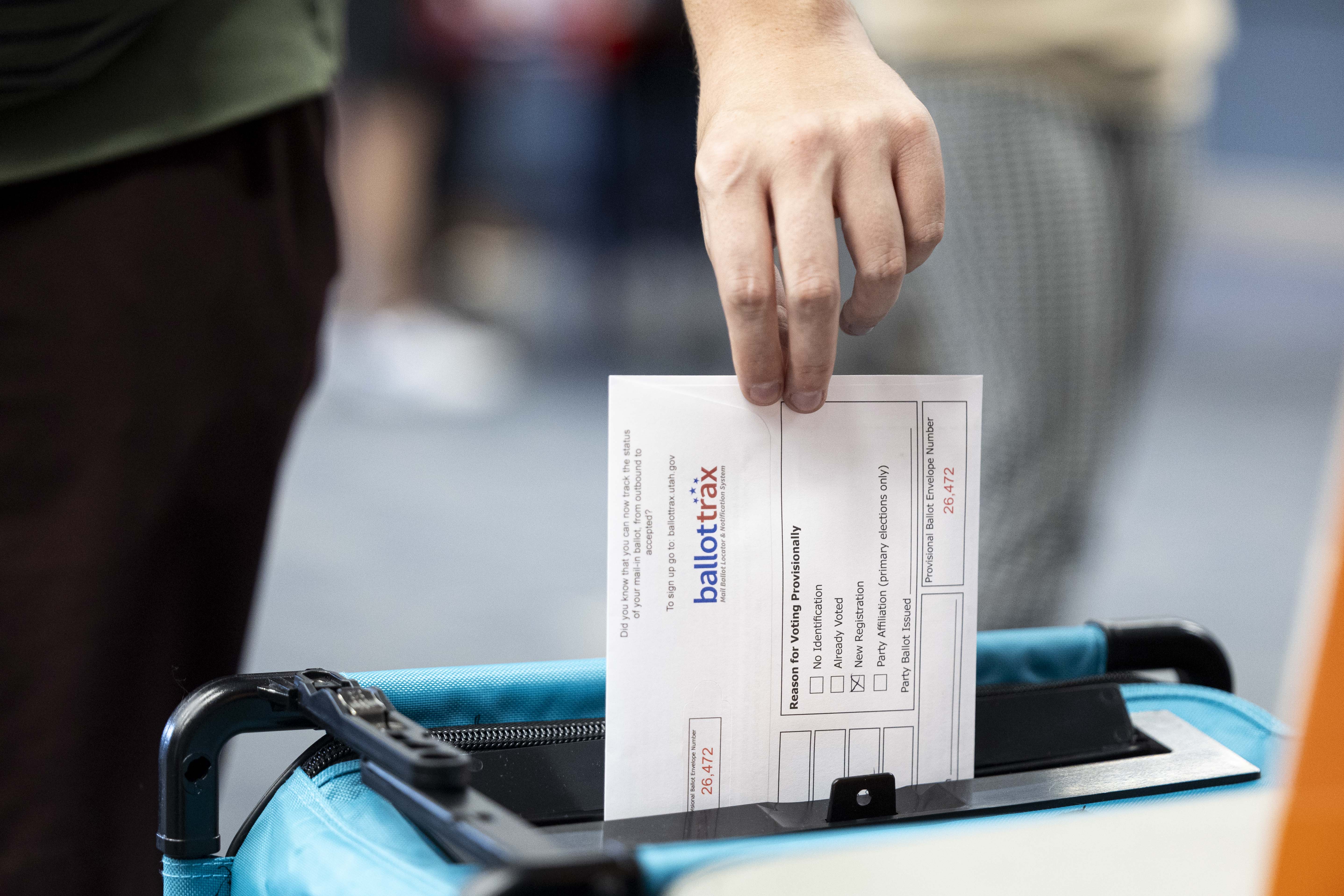 A federal judge on Friday blocked President Donald Trump's administration from implementing parts of his sweeping executive order overhauling federal elections.