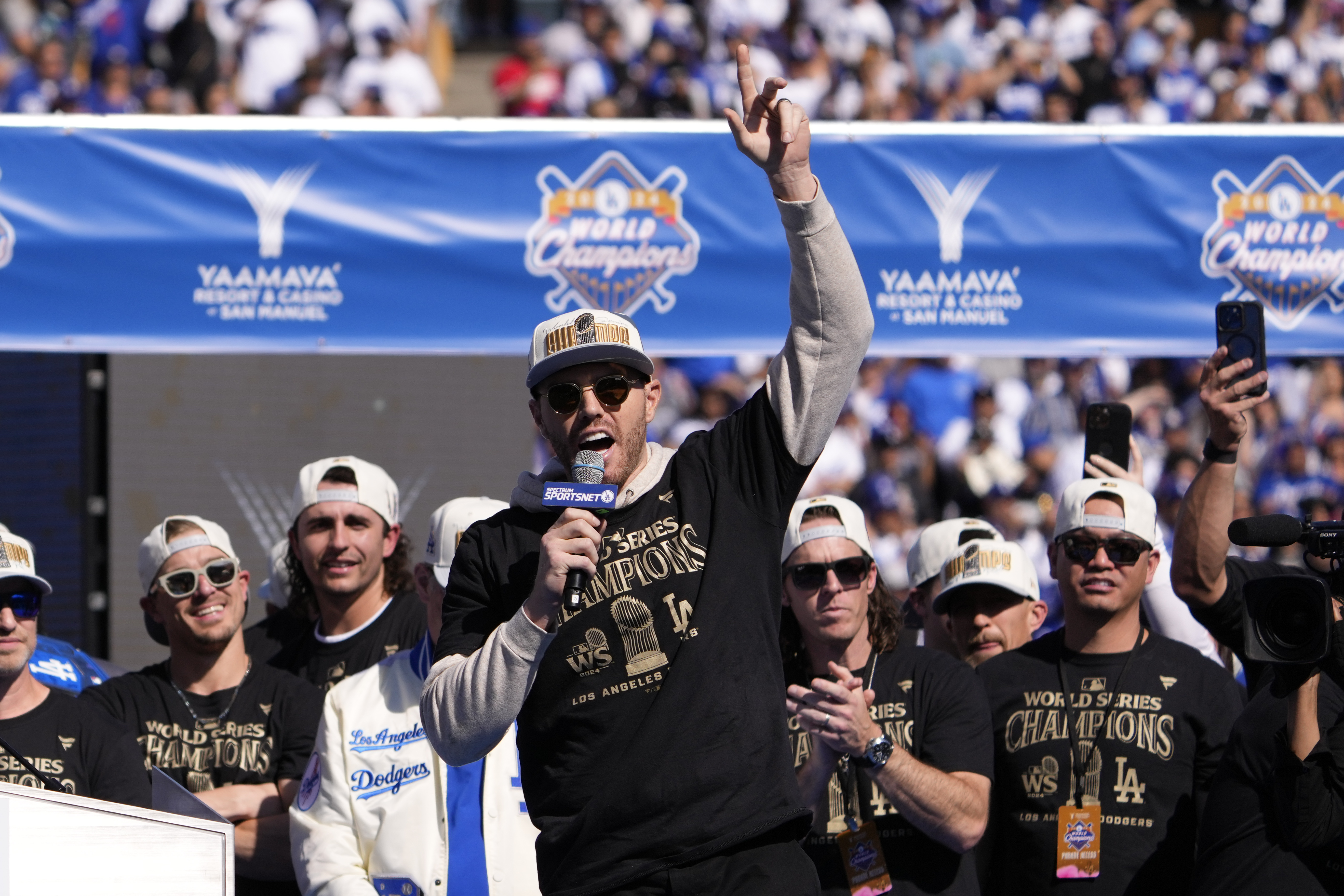 Los Angeles Dodgers' Freddie Freeman speaks during the baseball team's World Series championship parade and celebration at Dodger Stadium, Friday, Nov. 1, 2024, in Los Angeles.