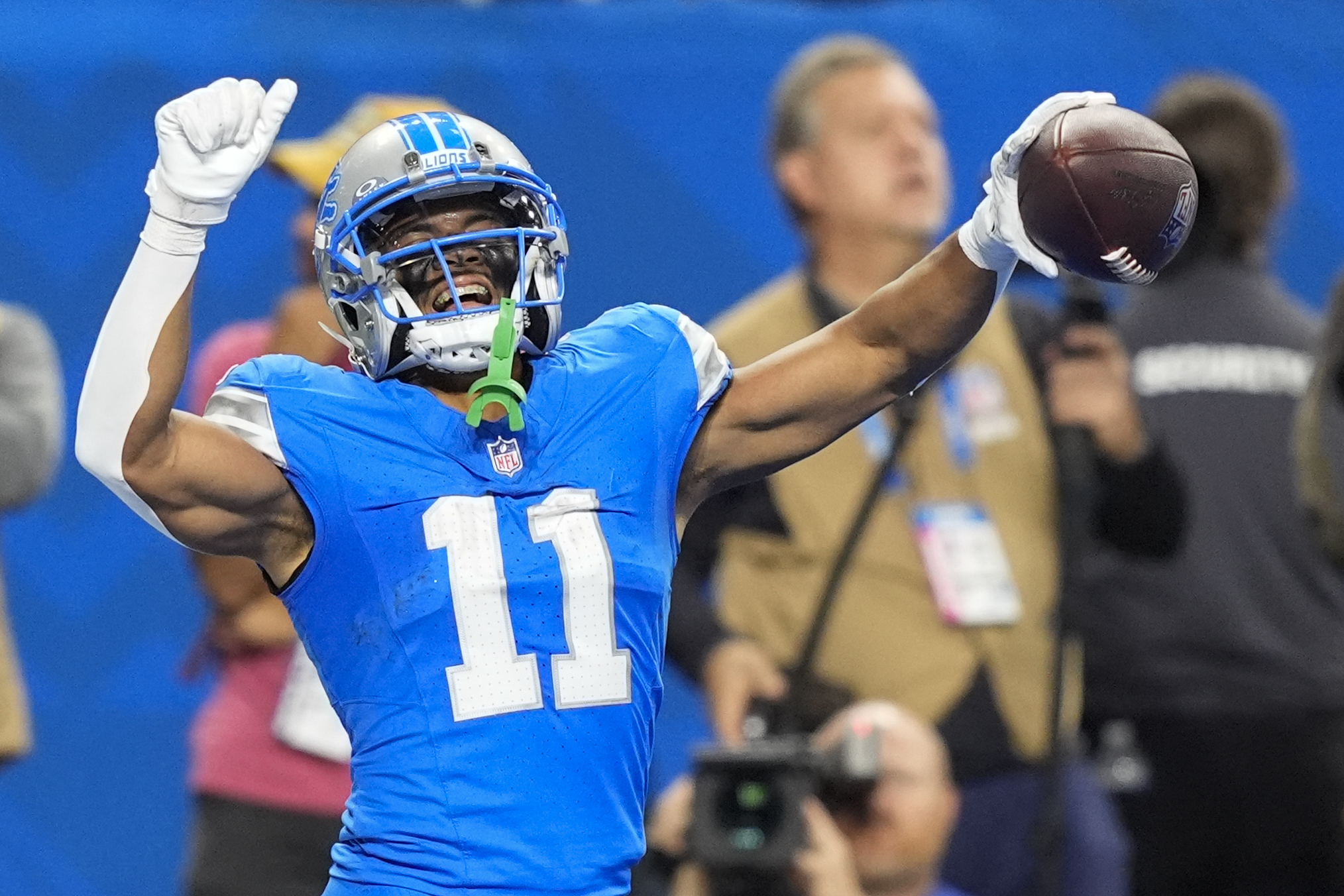Detroit Lions wide receiver Kalif Raymond (11) celebrates his touchdown during the second half of an NFL football game against the Tennessee Titans, Sunday, Oct. 27, 2024, in Detroit.