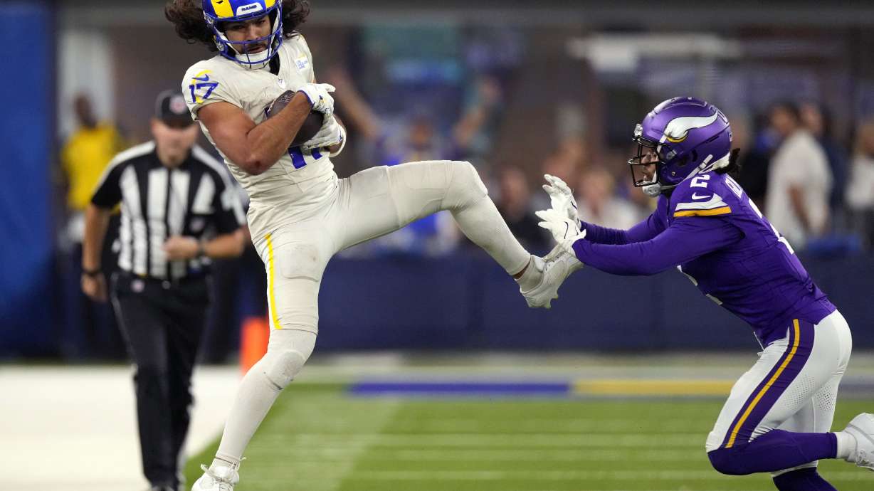 Los Angeles Rams wide receiver Puka Nacua (17) catches a pass as Minnesota Vikings cornerback Stephon Gilmore (2) defends during the second half of an NFL football game Thursday, Oct. 24, 2024, in Inglewood, Calif.