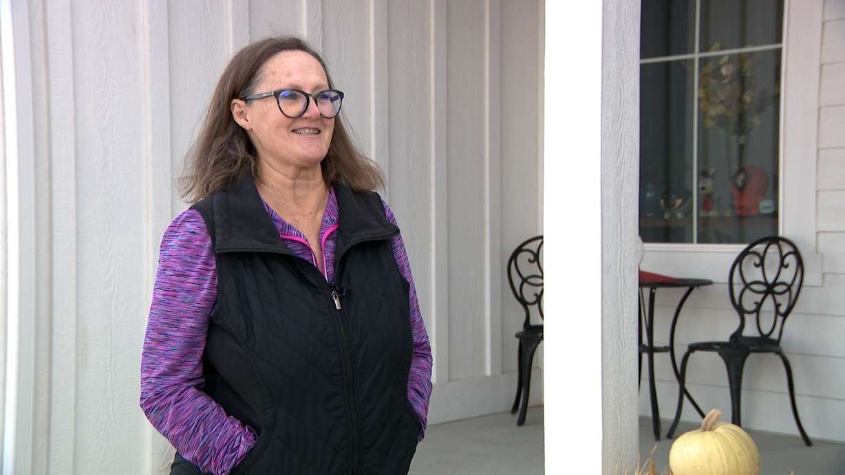 Pam Greenspon, pictured in Lehi on Friday, said the rate for her new home was higher than she would have liked.