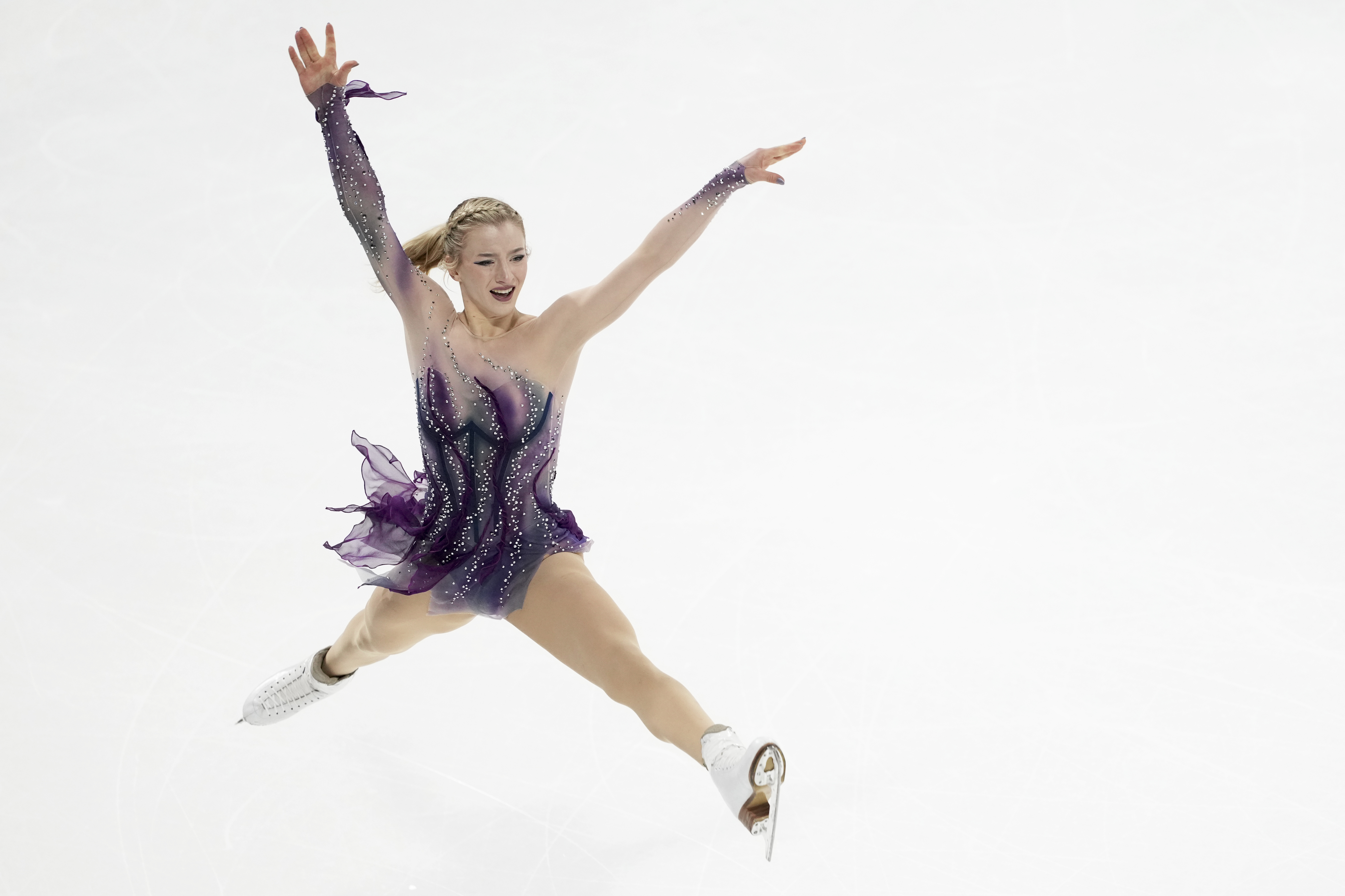 Amber Glenn, of the United States, competes in the women's free skating segment at the ISU Grand Prix of Figure Skating, Saturday, Nov. 2, 2024, in Angers, France.