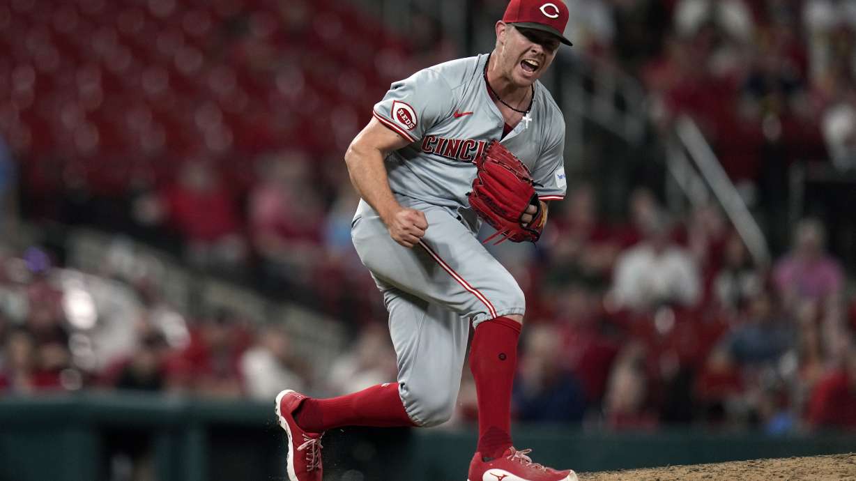 FILE - Cincinnati Reds relief pitcher Emilio Pagan celebrates after striking out St. Louis Cardinals' Matt Carpenter with the bases loaded to end a baseball game Tuesday, Sept. 10, 2024, in St. Louis.