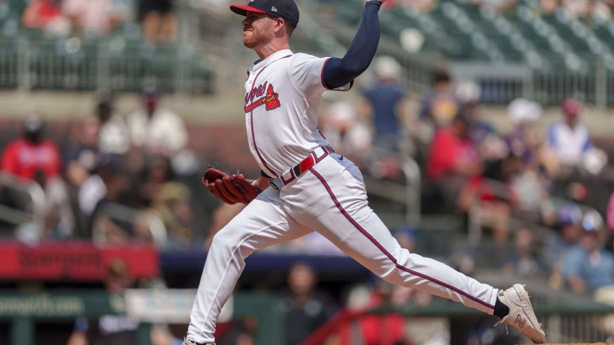 FILE - Atlanta Braves pitcher Aaron Bummer throws in the eighth inning of a baseball game against the Miami Marlins, Aug. 4, 2024, in Atlanta.