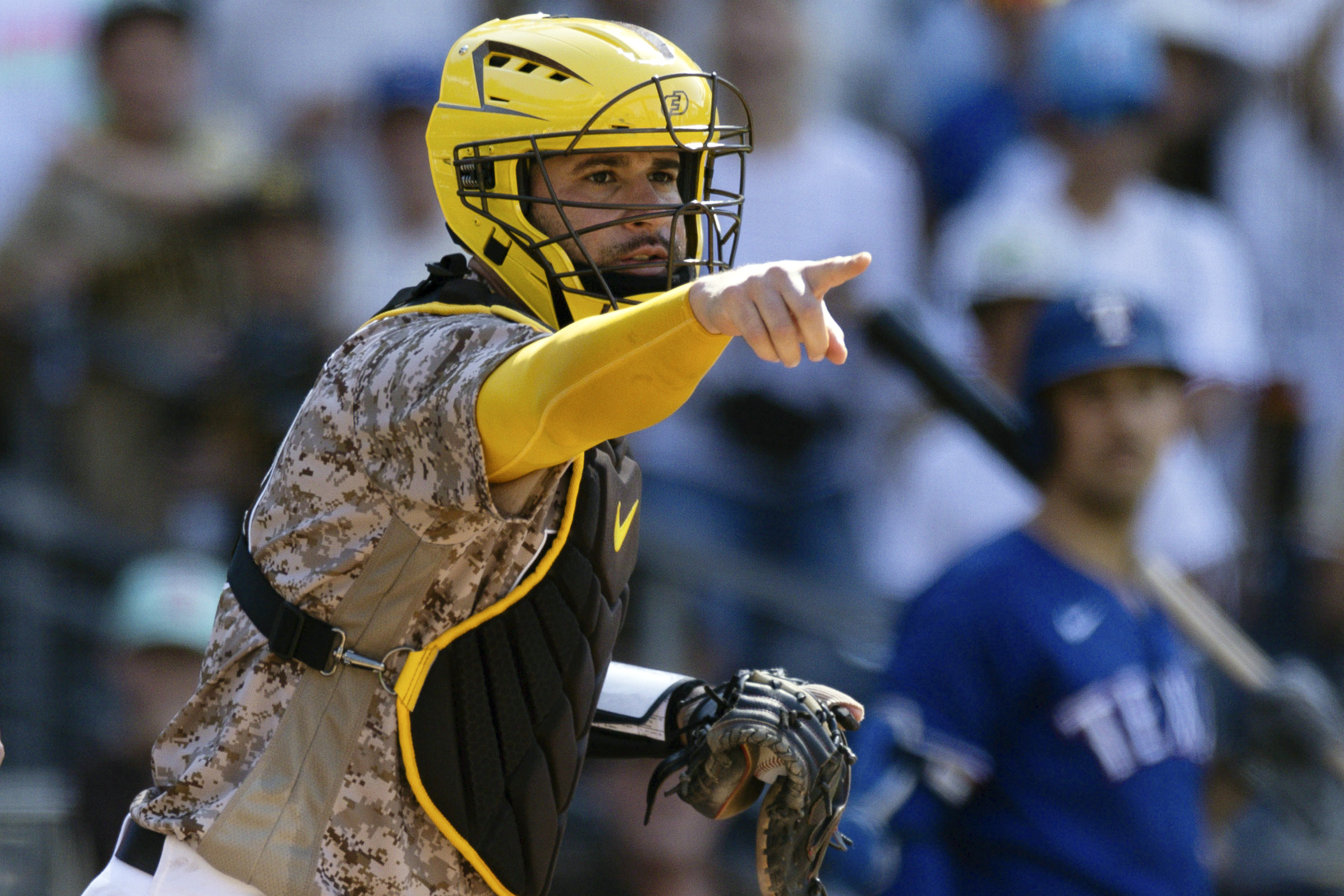 FILE - San Diego Padres catcher Gary Sanchez points towards first base in the ninth inning of a baseball game against the Texas Rangers Sunday, July 30, 2023, in San Diego.