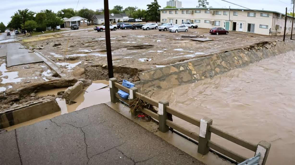 Debris and damage from severe flooding in Roswell, N.M., Oct. 20.