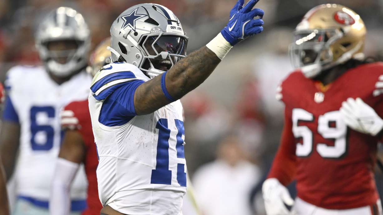 Dallas Cowboys running back Ezekiel Elliott gestures during the first half of an NFL football game against the San Francisco 49ers in Santa Clara, Calif., Sunday, Oct. 27, 2024.