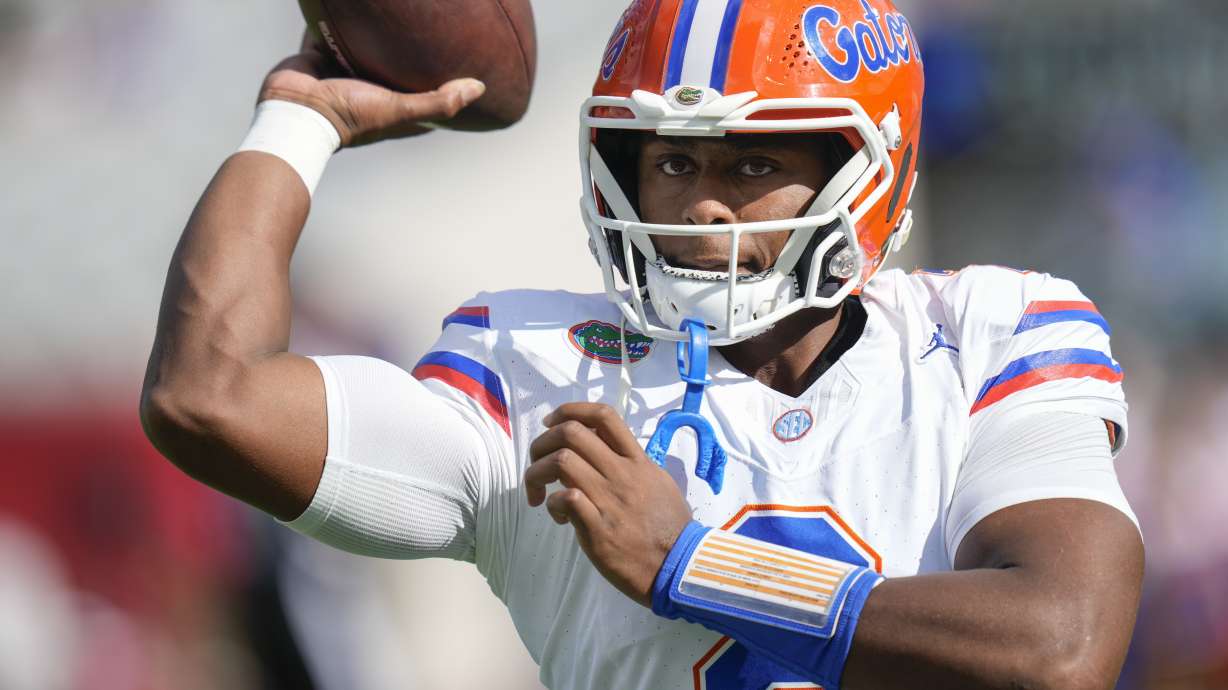 Florida quarterback DJ Lagway warms up before an NCAA college football game against Georgia, Saturday, Nov. 2, 2024, in Jacksonville, Fla.