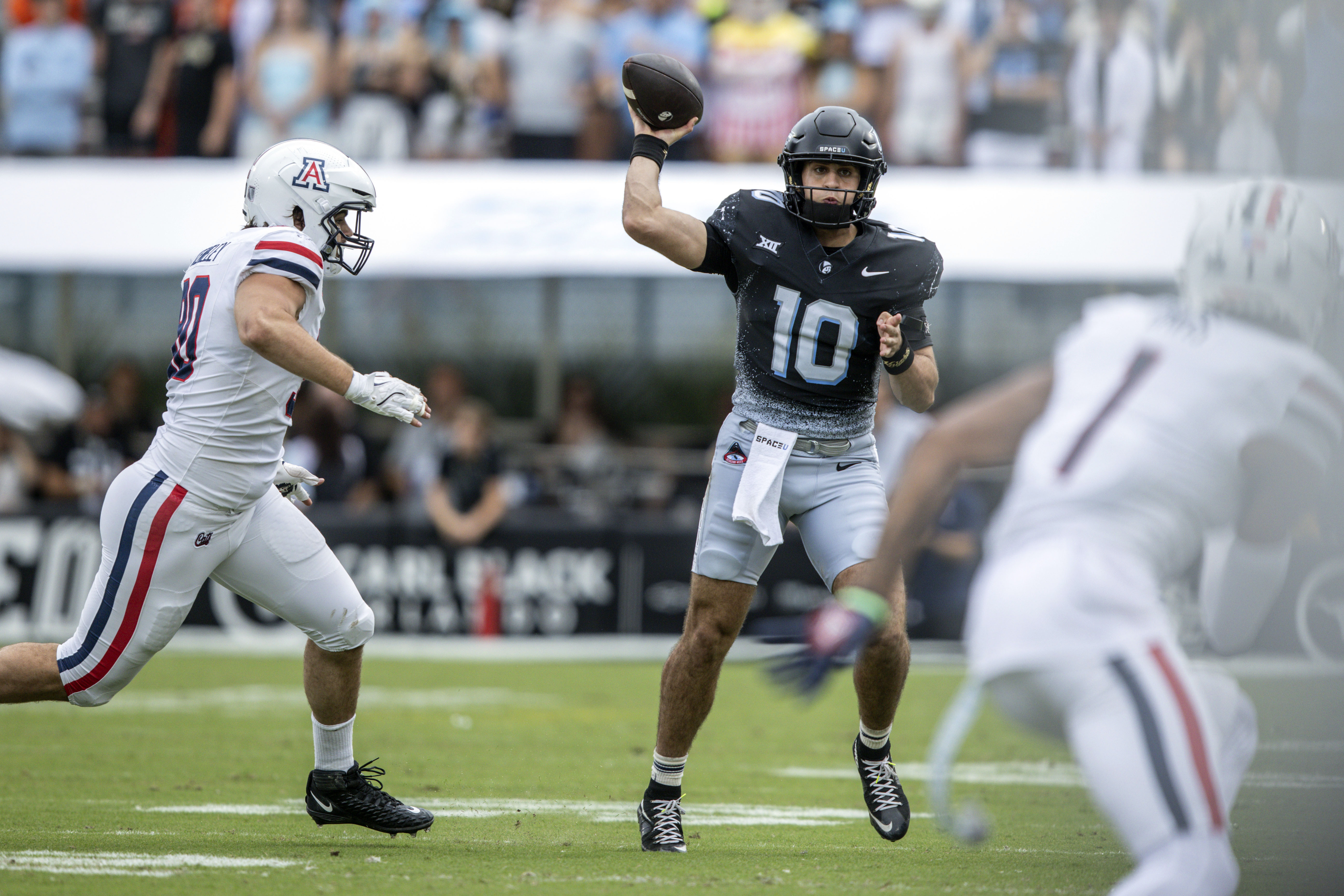 Central Florida quarterback Dylan Rizk (10) passes the ball against Arizona during the first half in an NCAA college football game, Saturday, Nov. 2, 2024, in Orlando, Fla.