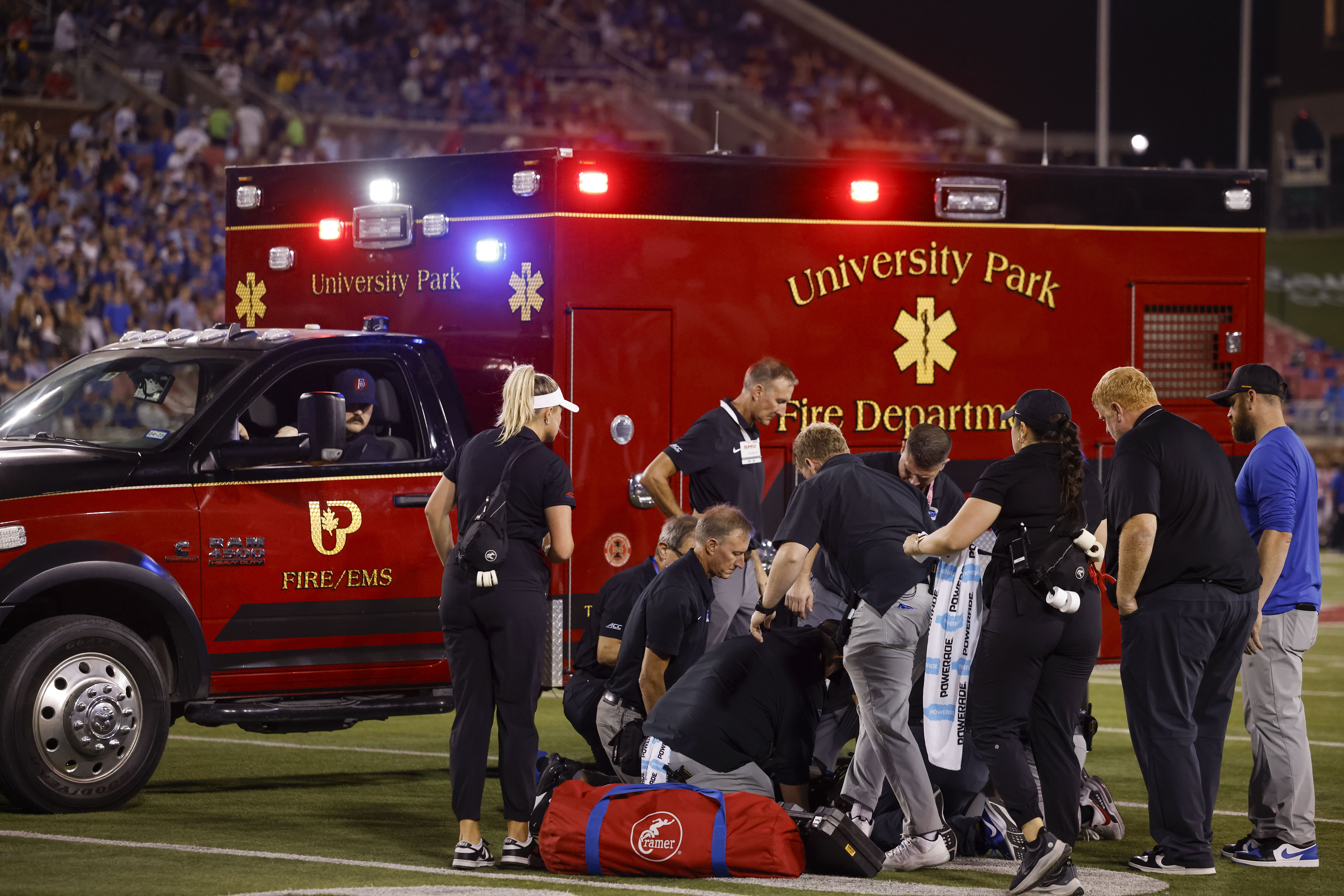SMU cornerback AJ Davis is worked on by medical staff after an injury during the first half of an NCAA college football game against Pittsburgh in Dallas, Saturday, Nov. 2, 2024.