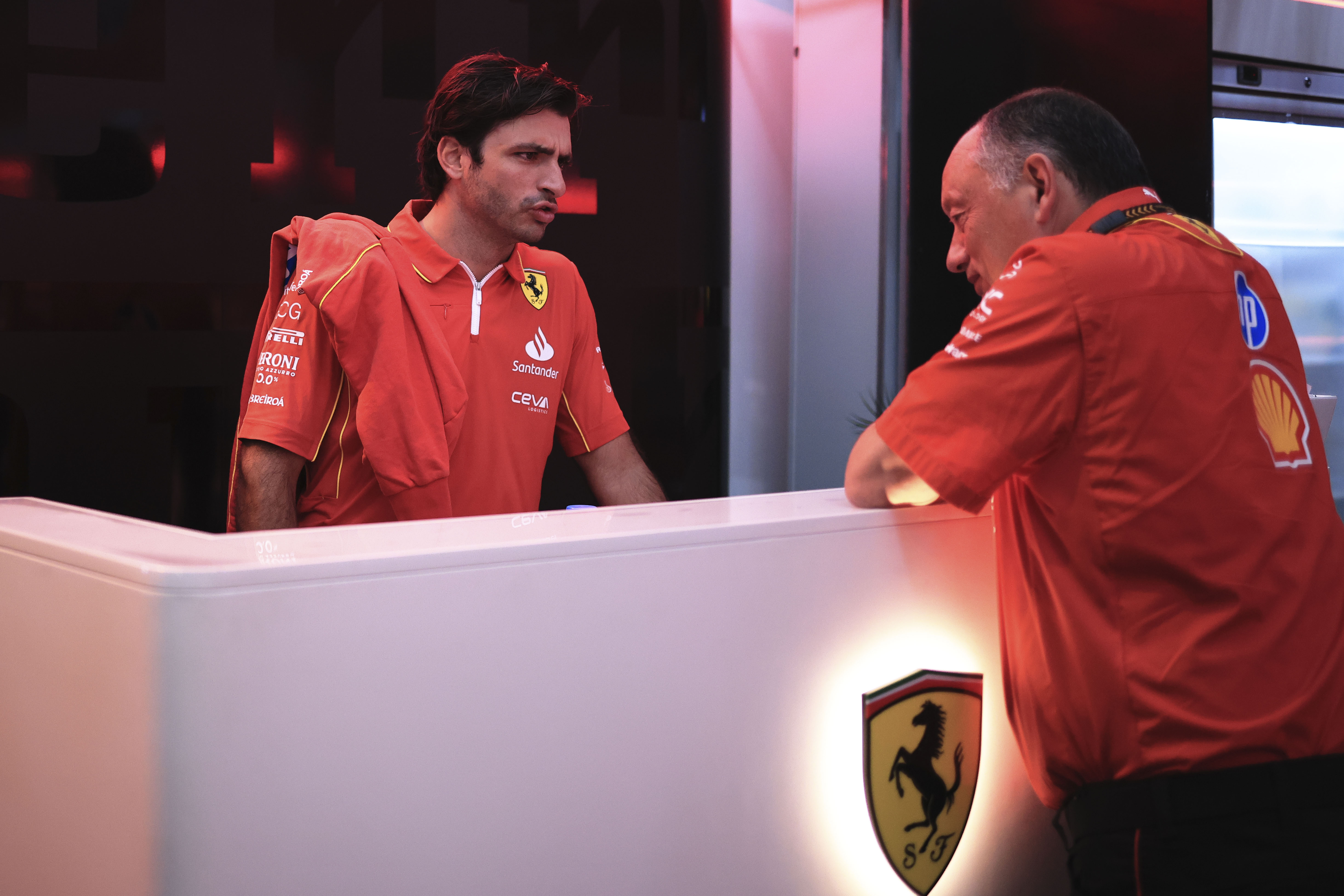 Ferrari driver Carlos Sainz of Spain, left, talks with Ferrari Team Principal Frederic Vasseur ahead of the Brazilian Formula One Grand Prix at the Interlagos race track, in Sao Paulo, Brazil, Sunday, Nov. 3, 2024.