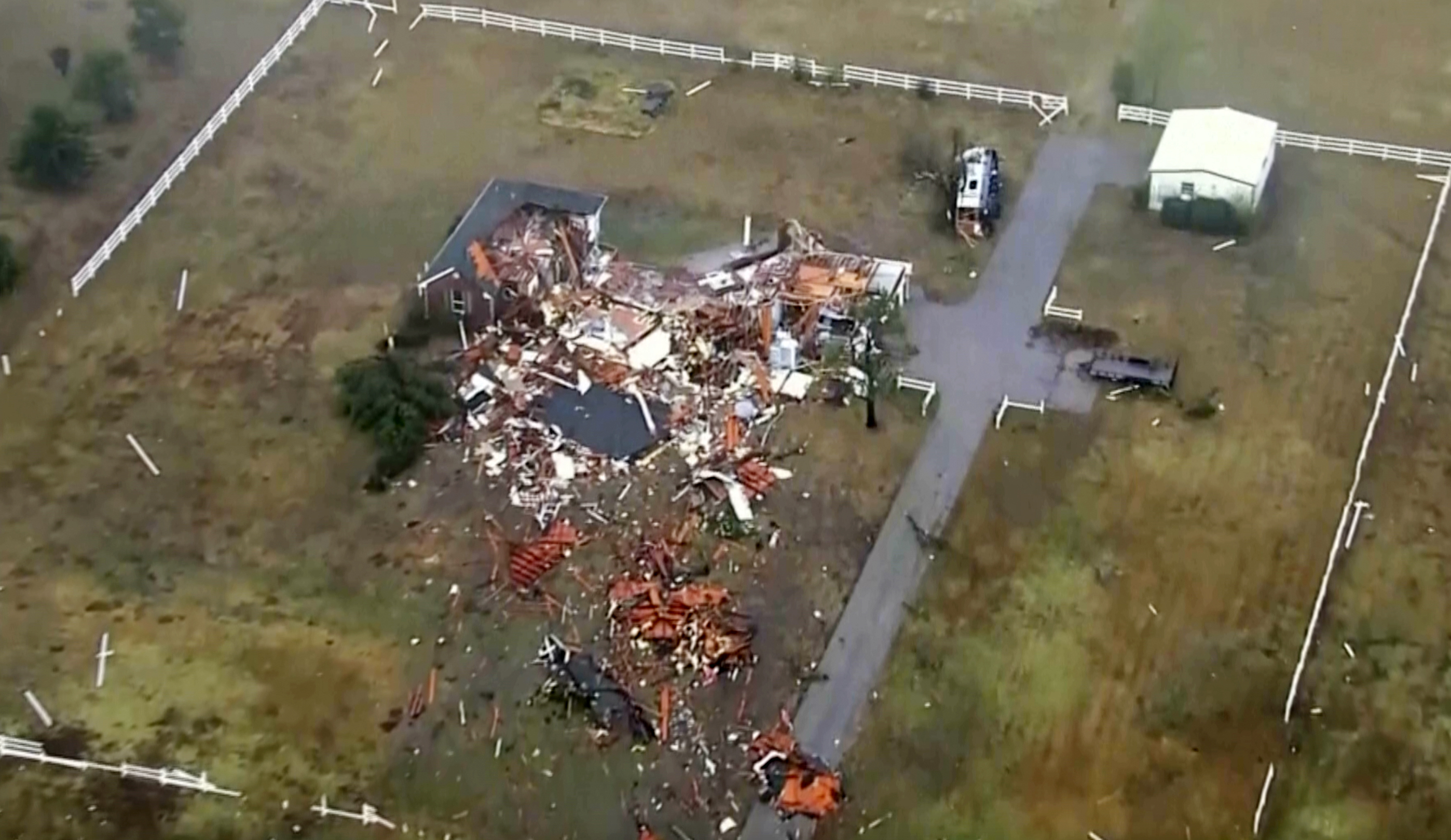 This image taken from video provided by KOCO shows damage caused by a tornado in a neighborhood near 89th and S. Sooner Road in North Moore, Okla., Sunday.