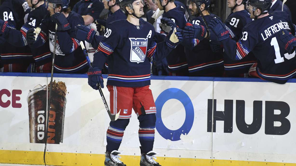 New York Rangers' Chris Kreider celebrates after scoring a goal during the first period of an NHL hockey game against the New York Islanders, Sunday, Nov. 3, 2024, in New York.
