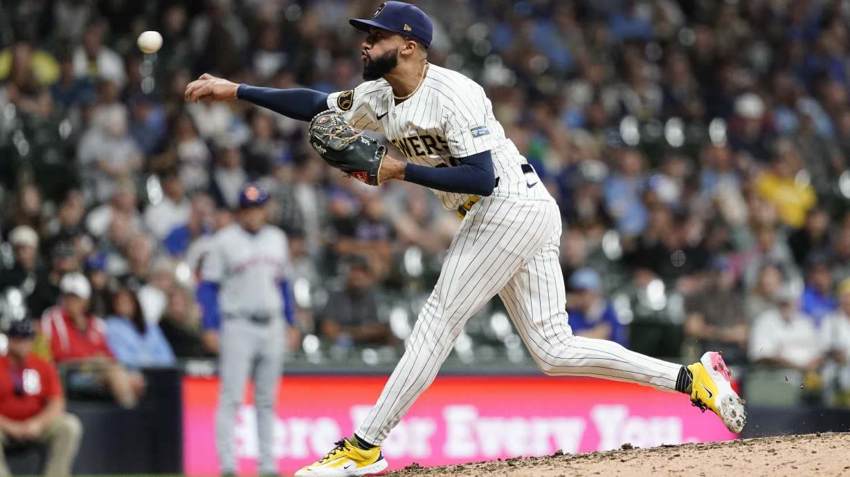 FILE - Milwaukee Brewers' Devin Williams pitches during the ninth inning of a baseball game against the New York Mets, Sept. 28, 2024, in Milwaukee.